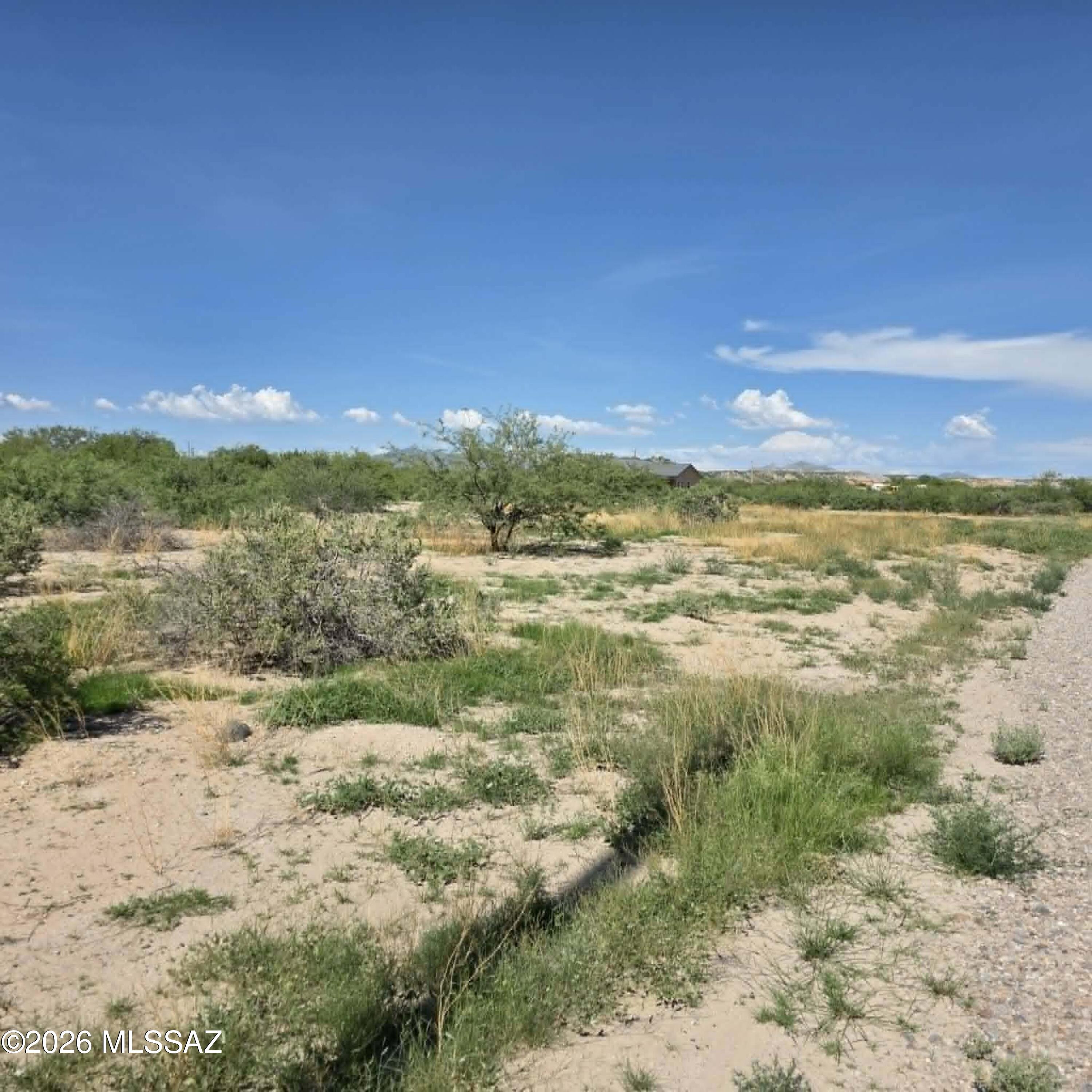 1 acre vacant lot with water located in Pomerene in a rural residential area with surrounding homes. This parcel has great opportunities for buyers looking to build or place a manufactured home in the desirable Pomerene area. Utilities are available at the property, including electric and water. Buyer to verify all facts including zoning, utility availability, building requirements.