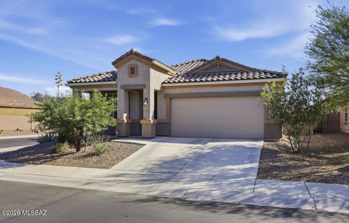 Welcome home to this beautiful 4-bed, 2-bath home built in 2022 in the vibrant Saguaro Bloom community with quick access to I-10. Enjoy a bright, open layout that connects the kitchen, dining, and living area, perfect for everyday living. The modern kitchen features stainless steel appliances, a large island, pantry, and stylish cabinetry. The primary suite offers a dual-sink vanity, walk-in shower, linen storage, and spacious walk-in closet. Three additional bedrooms provide flexibility for guests, an office, or playroom. The backyard is currently dirt and ready for the buyer's vision to create a personalized outdoor space. Community amenities include a clubhouse, gym, pools, splash pad, parks, and walking paths.