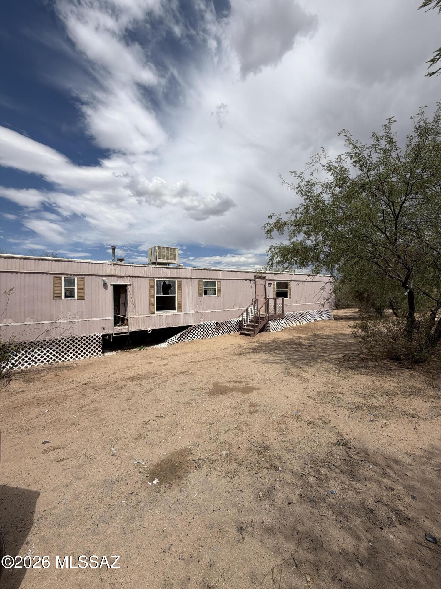 Fix-and-flip opportunity with tons of potential! Located on approximately 1 acre, this 1977 single-wide manufactured home features 3 bedrooms and 2 bathrooms and is ready for a complete transformation. The property requires cleanup, repairs, and renovation, making it an excellent opportunity for investors, flippers, contractors, or buyers looking for their next project. With a full acre of land, there is room to improve and maximize value. Property is being sold strictly AS-IS, WHERE-IS. CASH ONLY.
Buyer to verify all facts and figures, including square footage, utilities, zoning, permits, and intended use. Information deemed reliable but not guaranteed.