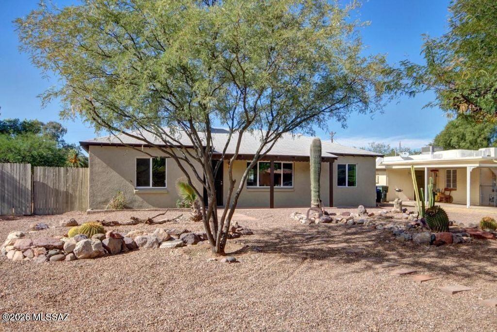 This is a darling home with a number of improvements and added features. The home has solar panels and Diamondback security screens and doors. All the floors were recently redone with ceramic tile. The roof was replaced in 2023 and the plumbing and sewer line were recently replaced. Owner will provide invoices. This home has a large kitchen and a split bedroom plan. The backyard is very large with a covered patio and shed with workshop. This yard has infinite potential. There is a current lease until 6/30/27.