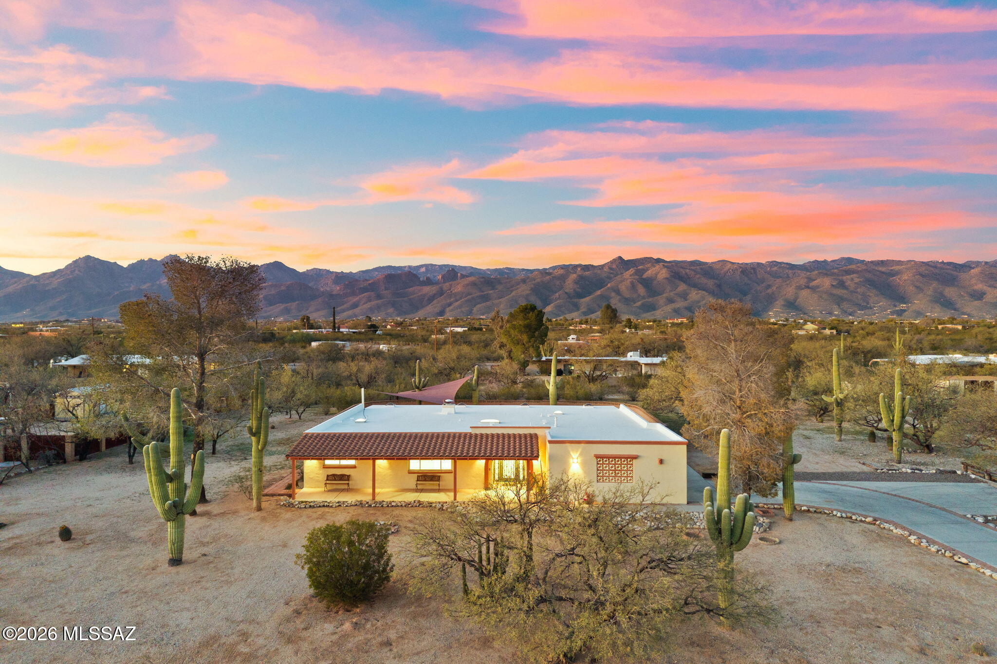 Located in the highly sought after Tanque Verde area of Northeast Tucson, this beautifully remodeled 4 bedroom, 2 bath home offers 2,333 square feet with a desirable split floor plan designed for both comfort and privacy. The interior has been thoughtfully updated with high end finishes throughout, creating a refined yet inviting living space. A versatile bonus room or office provides additional flexibility for working from home, hobbies, or a secondary living area. The backyard is designed to take full advantage of Tucson's outdoor lifestyle, featuring a large covered patio overlooking the pool with stunning Catalina Mountain views and exceptional privacy. Additional highlights include RV parking with hookups and a putting green, offering a unique combination of comfort, functionality, and outdoor enjoyment in one of Northeast Tucson's most desirable areas.