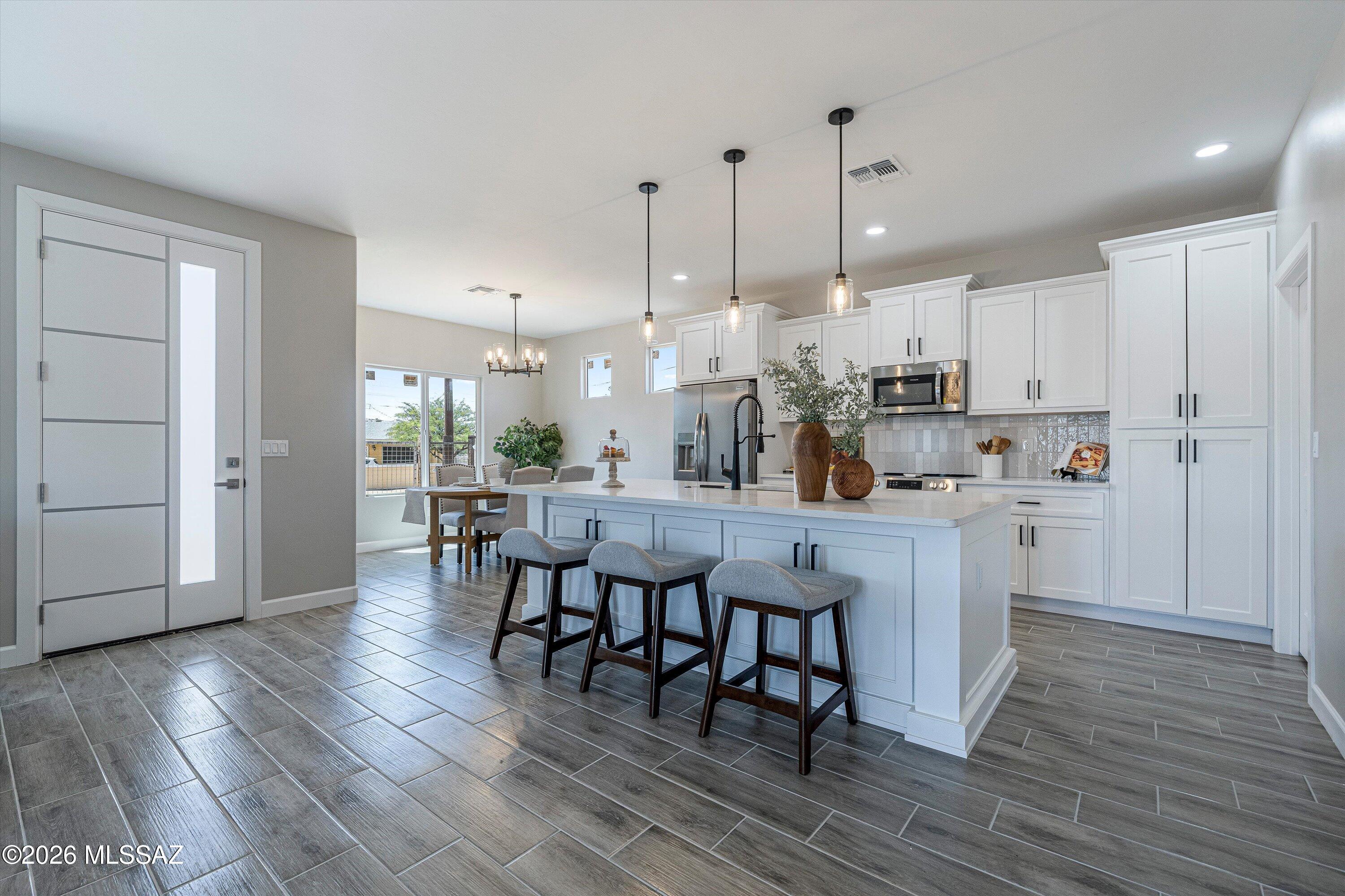 Discover this new built 3 bedroom, 2 bath, 9ft ceiling home on a desirable corner lot with modern design and functional living spaces. This thoughtfully designed floor plan features an open living area that connects seamlessly to the kitchen, creating a bright and spacious feel.
The kitchen offers a large center island, stainless steel appliances, abundant cabinet space, and a spacious walk in pantry. The primary bedroom includes a walk in closet and a well appointed bathroom designed with comfort and practicality in mind.
Additional highlights include 2 RV gates, added corner lot privacy and accessibility, and contemporary finishes throughout the home. With quality craftsmanship and a clean modern aesthetic, this new construction property is ready to be enjoyed. Schedule your showing to