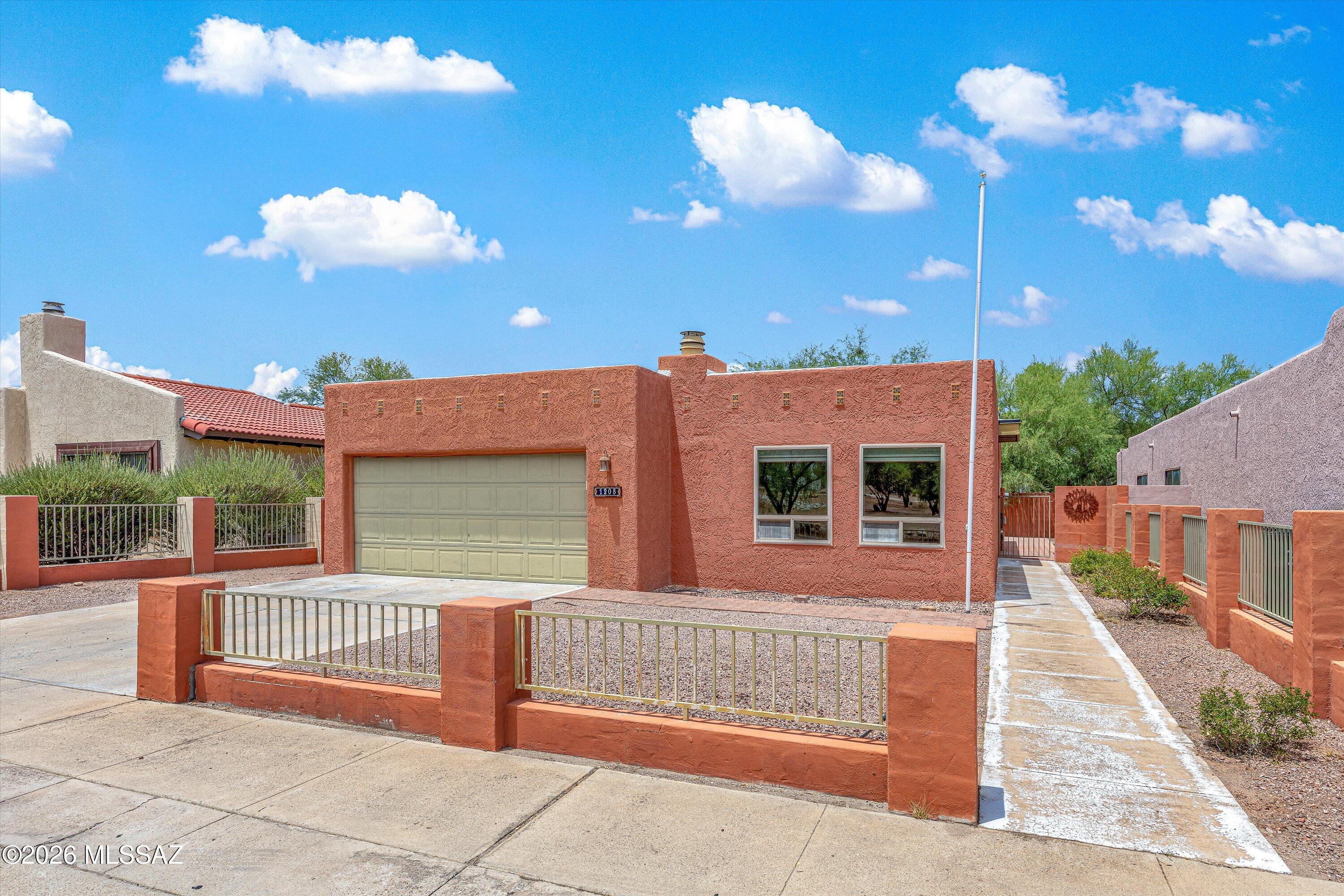 ROOF AND AC ARE ONLY 3 YEARS OLD!      
AND ALL NEW CARPET!
NO HOA!
Discover the perfect blend of comfort and convenience at 1208 S Brown Ave. Nestled in a peaceful pocket of Tucson, this 1,652 sq. ft. home features 3 spacious bedrooms and 2 full bathrooms. The property offers a serene living atmosphere while keeping you connected to everything you need. Families will appreciate the close proximity to Marshall Elementary School ( which sits just half a mile away), local parks, shopping, and everyday amenities. ,. Whether you are looking for a bikeable neighborhood, a quiet place to unwind, or a property with solid bones to add your personal touch, this home delivers.