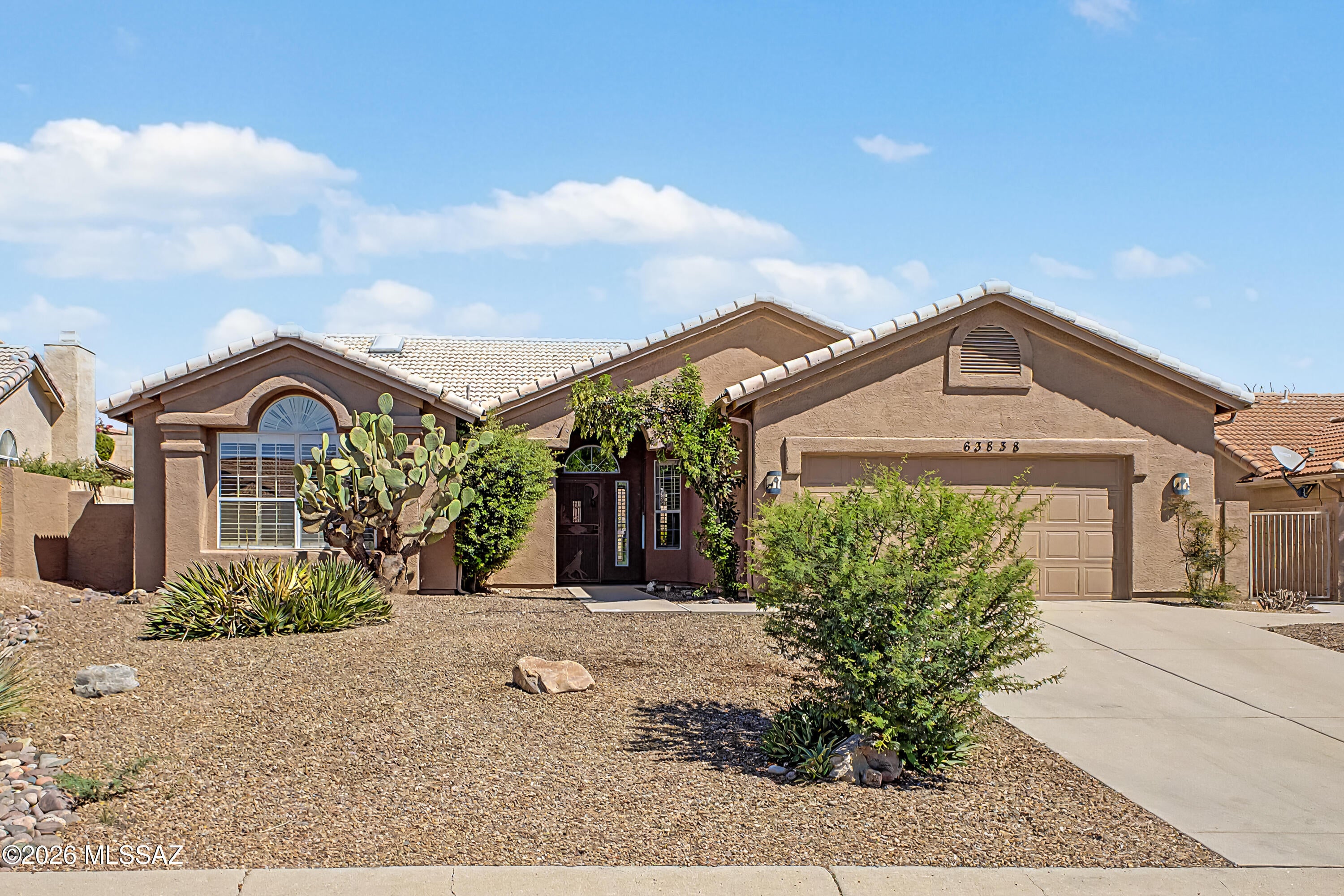 Desirable Saddlebrooke an active adult community. . Bright open feeling home. Spacious greatroom concept floor plan. 3 large bedrooms. 2 full baths Single story, NEW Kitchen has a big island a breakfast nook, lots of counter tops. Living area offers vaulted ceilings, & large windows create a light and airy ambiance. Family room off kitchen. Covered patio, nicely landscaped huge back yard. 2 car garage, Plus separate golf cart garage. New Flooring, new remodel bathrooms, freshly painted on the inside and out, don't miss out on this great HOME.