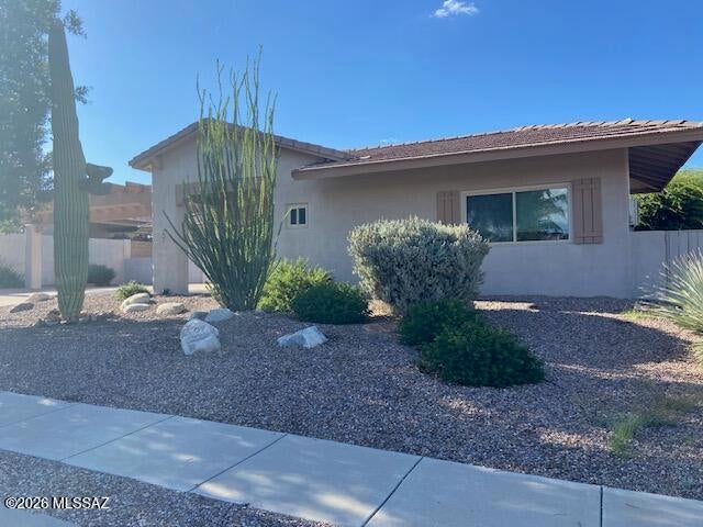4 bed and 3 bath contemporary home with mother-in-law suite.  Nice extended garden  patio with multiple French doors.  Master bedroom suite includes French doors to covered patio, large bath including soaking tub and luxury walk in closet.  Mother in law suite has French doors to garden patio.    Kitchen has an island with lots of cabinets, stainless steel appliances and large pantry closet.  Jack and Jill bath, large laundry room and 3 car extended garage.  Lots of value here, take a look.