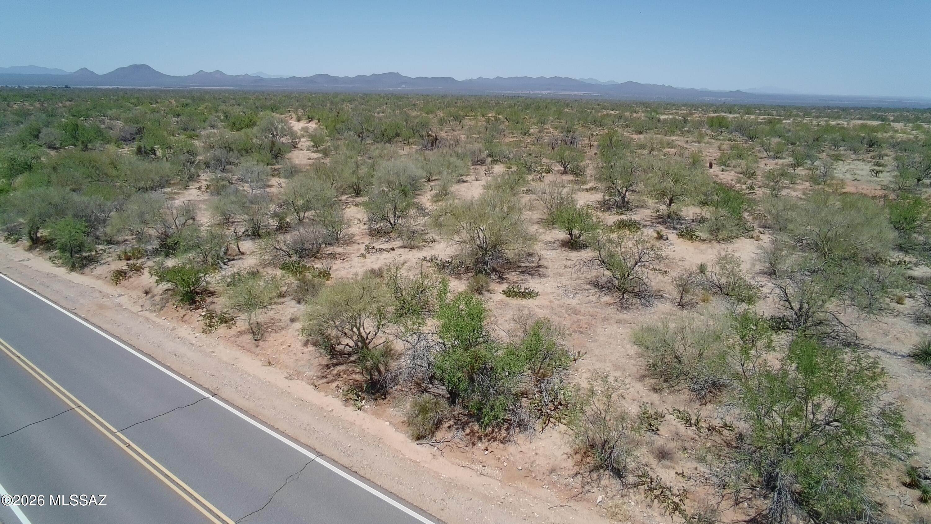 Escape the crowds and build your custom desert oasis! Nestled beautifully between Arizona's stunning ''Sky Islands,'' this premium 1.28-acre corner lot offers the perfect blend of pristine desert tranquility and accessible modern convenience. Situated high up on the corner of Diamond Bell Ranch Road and Berwyn Place, you will enjoy panoramic mountain views, unmatched Southwest sunrises, and postcard-perfect sunsets every single day.