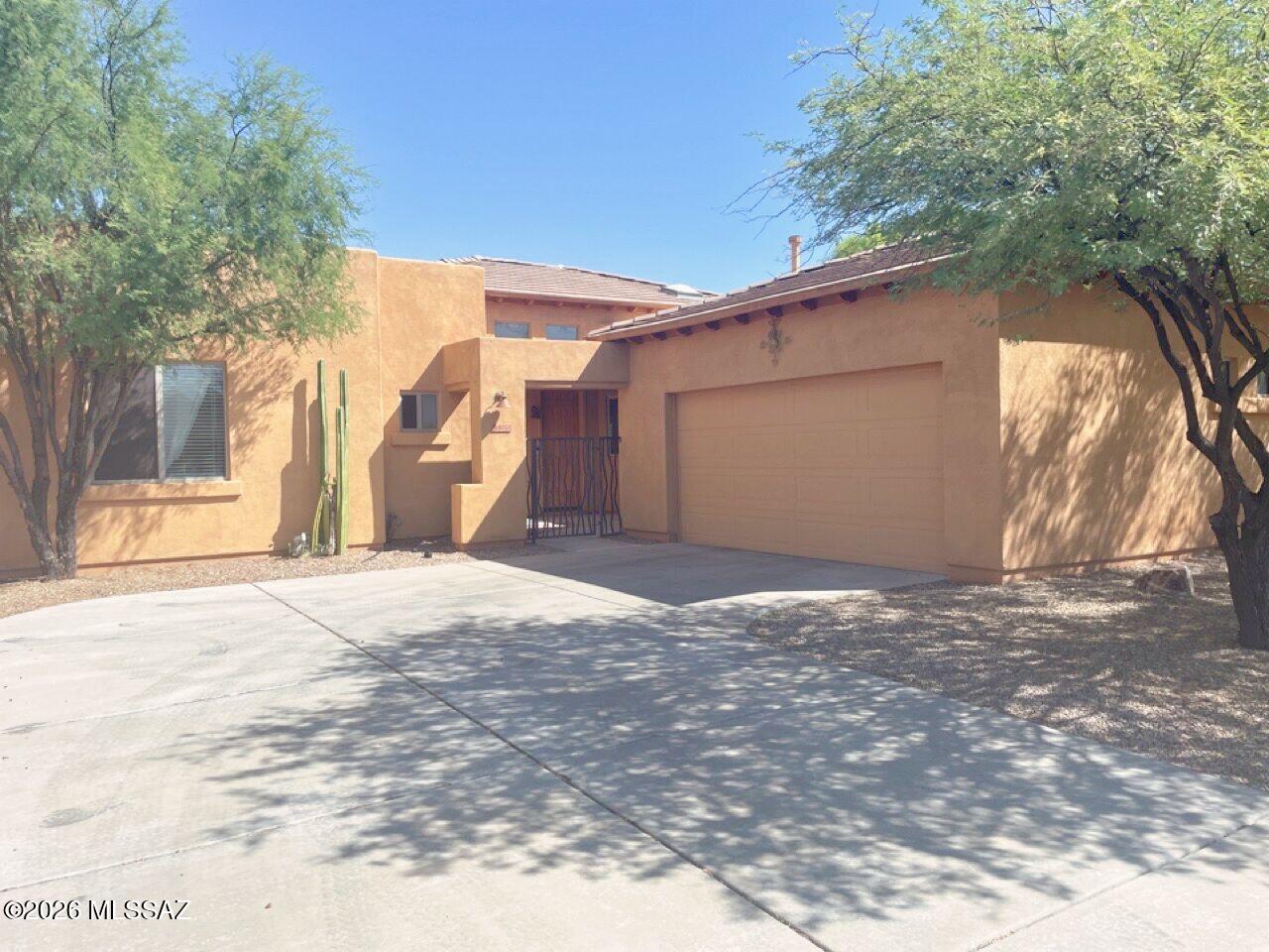 No Application Fees! Very nice 3 bedroom, 2 bathroom single level Tucson home located in the Continental Reserve community, offering an open floor plan with comfortable living space and thoughtful updates throughout. The home features wood laminate flooring in all living and high traffic areas with carpeting in the bedrooms, two tone neutral paint, and excellent natural light. The spacious living room includes a stone fireplace and flows seamlessly into the updated kitchen, which features granite countertops, subway tile backsplash, upgraded cabinetry, breakfast bar, and stainless steel appliances. Washing machine and dryer are included. The professionally landscaped backyard offers a covered patio, extended paver patio, synthetic grass area, and easy to maintain plants and trees, creating an inviting outdoor space.

Located near Silverbell Road and Twin Peaks Road in Northwest Tucson, this home offers convenient access to shopping, dining, neighborhood parks, and nearby hiking and biking trails. Continental Reserve provides a residential setting with proximity to major roadways for easy commuting while enjoying the scenic desert surroundings of the Tucson Mountains.

All Denali Real Estate residents are automatically enrolled in the Resident Benefits Package (RBP) for $55.00/month which includes Renter's Liability Insurance, Credit Building to help boost the resident's credit scores with timely rent payments, up to $1M Identity Theft Protection, HVAC air filter delivery (for applicable properties), our best-in-class resident rewards program, and much more!
