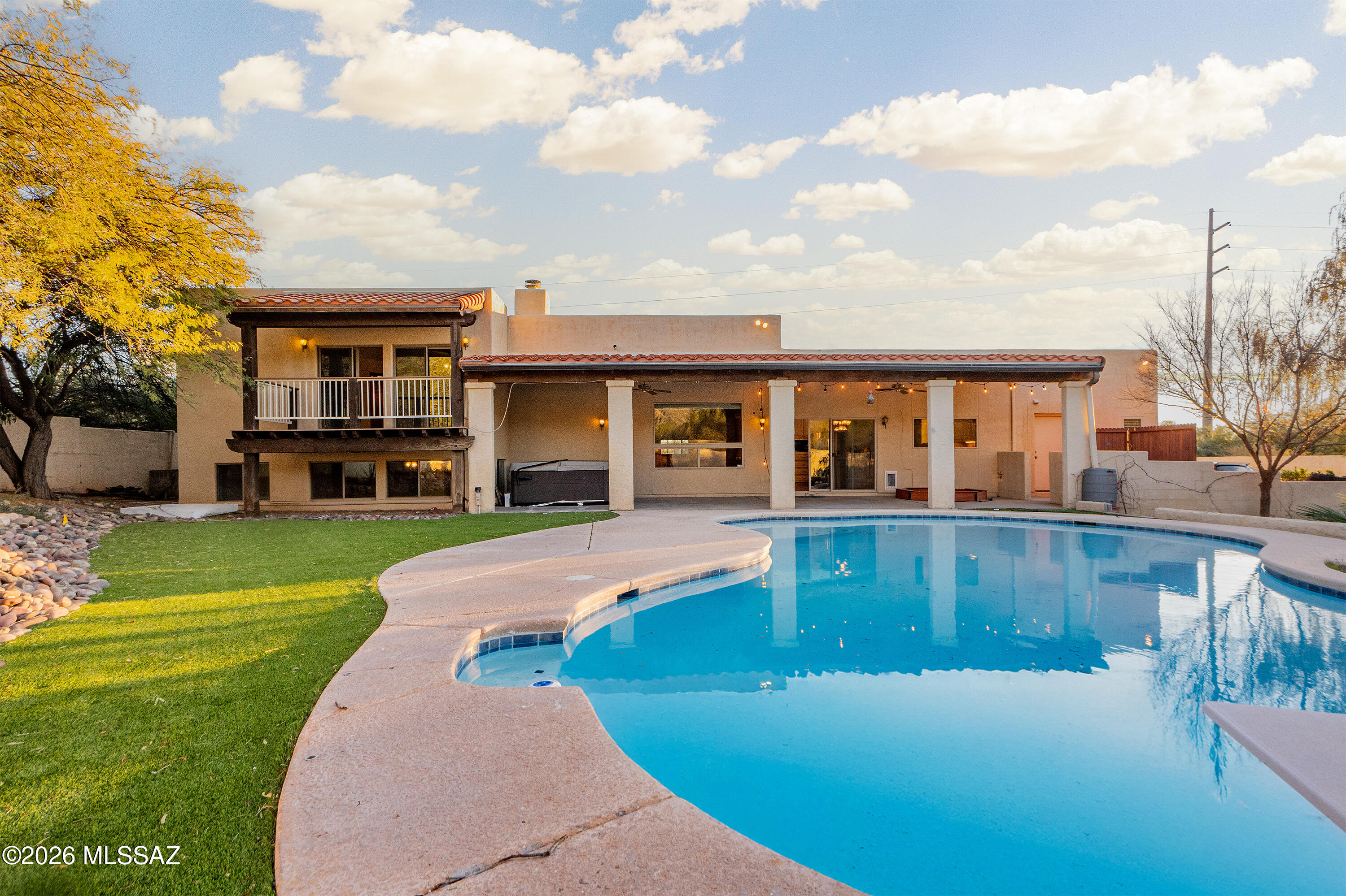 Cimarron Foothills, this spacious split level 5BR/4BA will fit all of your family's needs! Kitchen with high ceilings, views, granite counters and island, travertine tile backsplash, 6-burner gas stove w/grill & double-oven all ready for your serious creations! Primary suite w/own balcony w/great views, huge closet.  Sparkling pool, newer spa and breath-taking mountain views all await your next move.  The home is a true desert retreat. Resort-style backyard is perfect for entertaining or just relaxing. Less than a mile to Gavi, Ginza and El Charro restaurants, Basha's, 2 miles to Ventana & Sabino Canyon for that next awesome hike. Private drive to 3-car garage, then to circular drive, fountain and main entrance.  Seller is out of state and is very motivated, says 'time to sell'!
