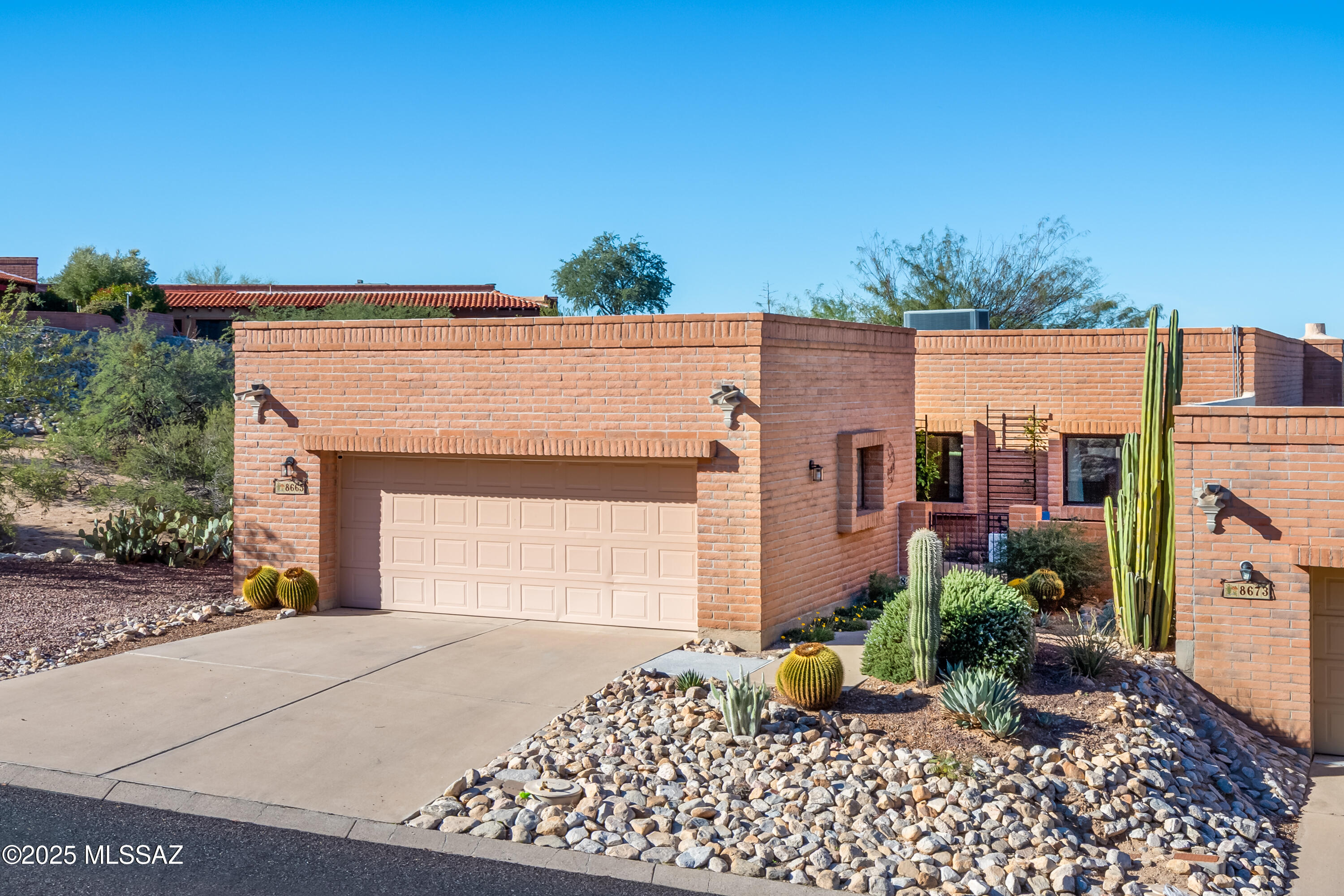 Welcome to this Beautiful Townhouse in the Highly Desirable Fairfield La Cholla Hills 55+ Community in Northwest Tucson. Featuring a gas Beehive fireplace this 2 Bd,2 Ba plus office/den, 2 car garage home also features a completely enclosed add'l 230 sq ft Arizona
Room w/mini split & floor to ceiling windows with fantastic views of our amazing Arizona sunsets & neighboring golf course. It is also adjacent to community open space on two sides w/an abundance of natural light offering frequent wildlife viewing. The Laundry w/a new washer & dryer is off of the eat-in kitchen which offers plenty of counter & storage space as well as a new GE Elite refrigerator. The spacious living area features a large open dining room comfortably seating 10. The guest room offers a queen murphy bed with built in
desk making this room perfect for occasional guests or as a craft room. Updated bathrooms, new sinks, faucets and showerheads throughout. For a minimal fee this nicely appointed unit can be purchased furnished so that you can take your time selecting the items you might want to change out while enjoying the freedom to get right out the door to enjoy all of the activities Tucson has to offer including our loop trail system which is accessible right across
the street from the entry to La Cholla Hills. Don't miss this opportunity.