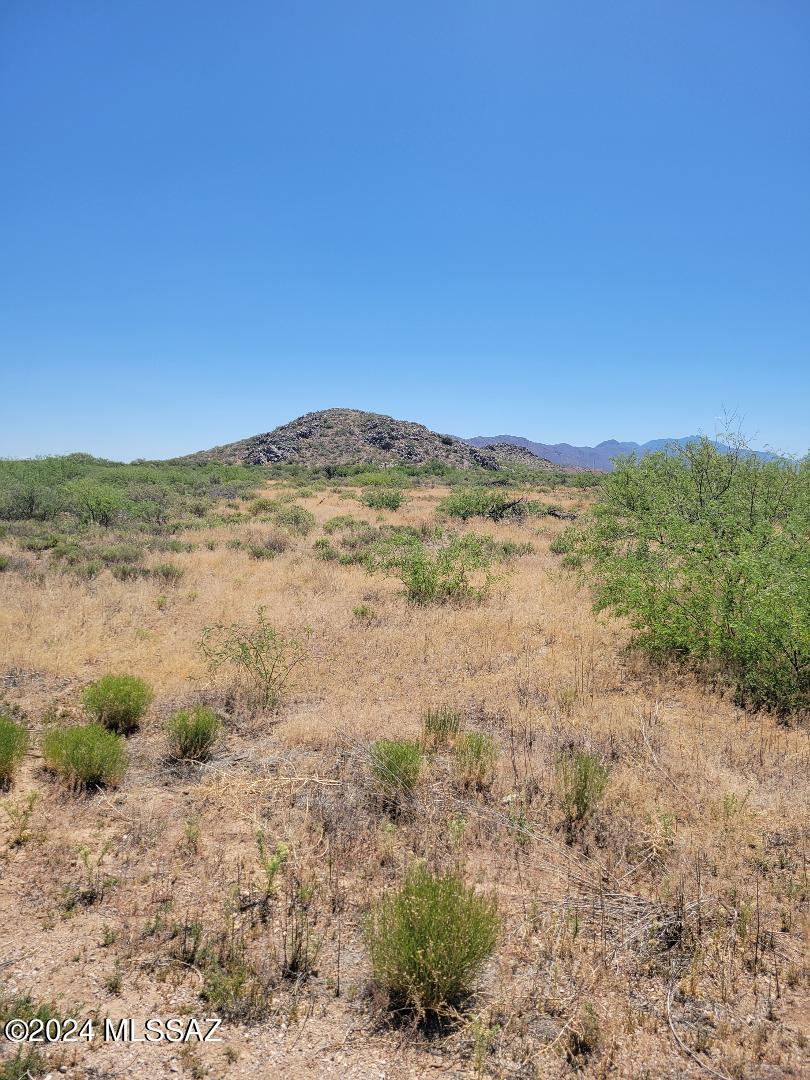 Priced to sell, this 39.62 acres offers convenience to town and privacy.  Terrain runs from level rising to a rugged hillside which would offer a beautiful, elevated home site.  Sweeping views and privacy abound.  Area of custom homes yet true country living.  Power is at the corner of Old Stewart and Wolf Court.  Fully fenced in barbed wire.
Wolf Court is a cul-de-sac for limited traffic. This parcel is nestled at the end of the cul-de-sac.