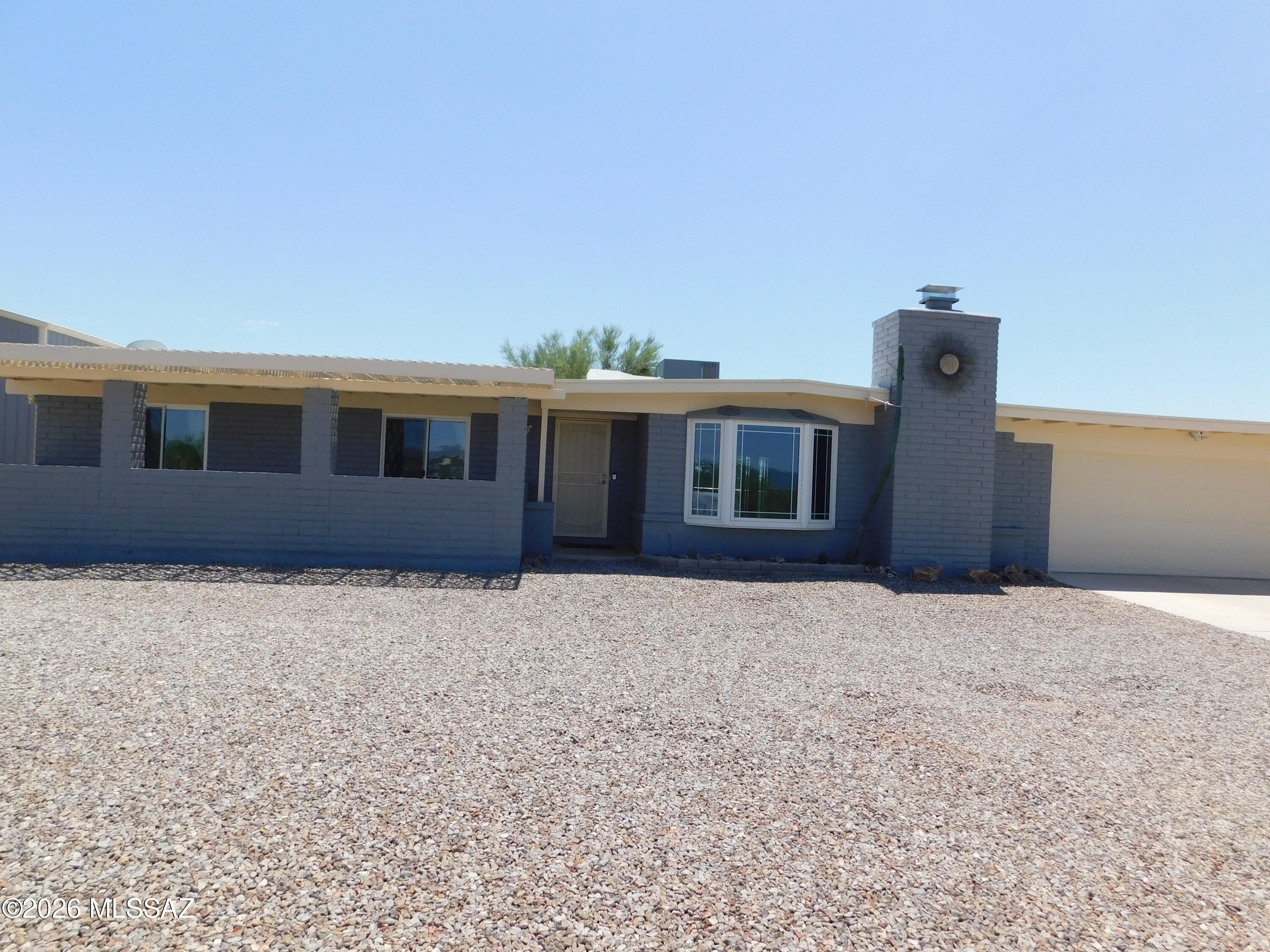 Nicely updated masonry ranch home with absolutely INCREDIBLE panoramic views. Possibly the highest lot in the subdivision with breathtaking views of the valley. I imagine a castle sitting up on this high ridge overlooking the kingdom below. The house has been nicely updated with a modern kitchen including quartz counters and stainless steel appliances. Exterior painted. New carpet. Newer AC/gas pack. Roof recoated. Located in the county with no HOA this is a must see property. Move-in ready.