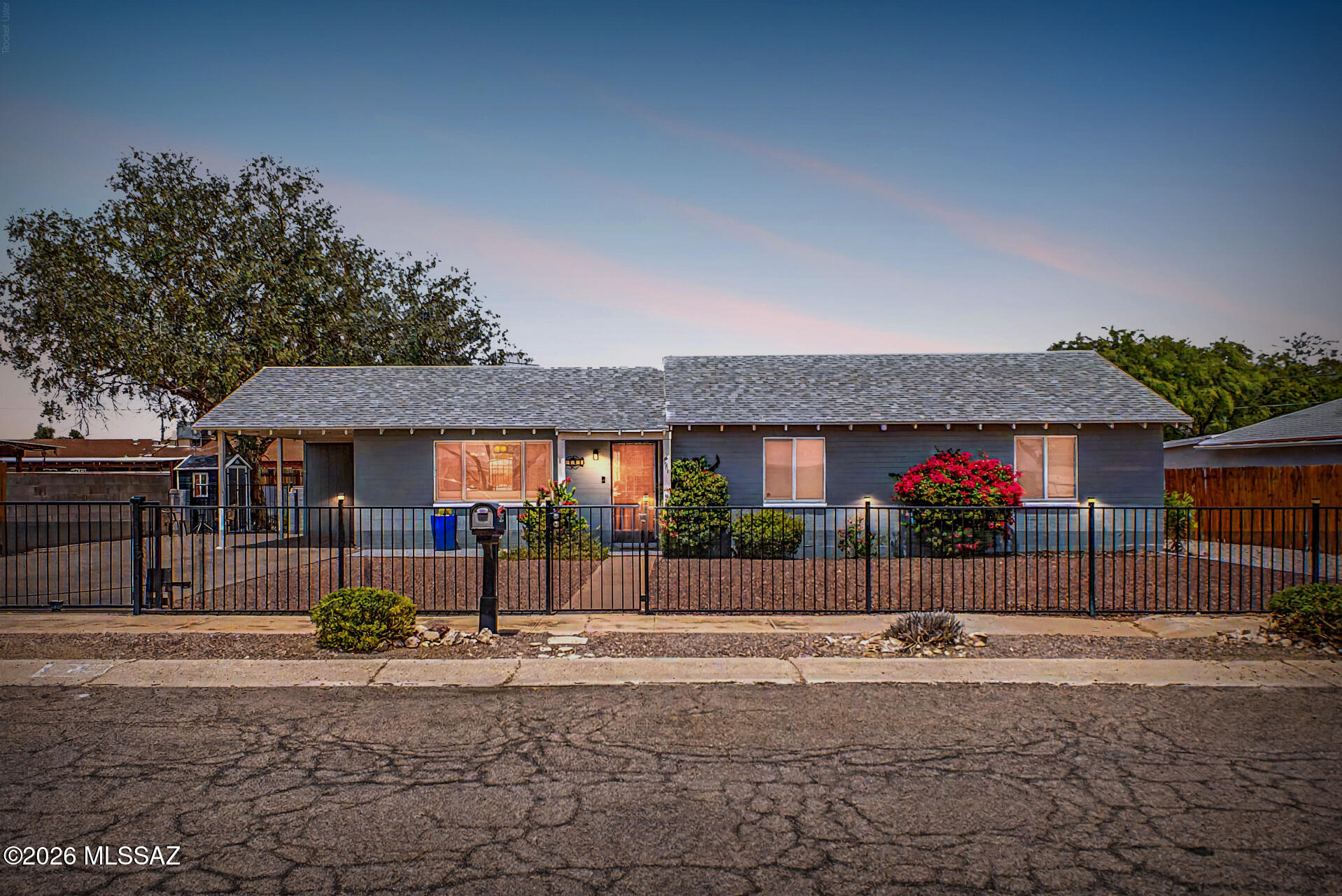 2.25% assumable VA loan, VA-qualified buyers! Beautiful mid-century modern 3-bedroom, 2 bath home located in the heart of Tucson! Situated on a spacious lot, fully fenced w/ an electric gate, this property offers both privacy & functionality w/ large front & back yards perfect for outdoor living. Enjoy a cocktail on your back patio after a long day while enjoying the peaceful mountain views. Inside, you'll find new flooring throughout, & a thoughtfully designed chef's kitchen, perfect for culinary enthusiasts & entertaining w/ tastefully updated bathrooms that blend style & comfort. The home has been meticulously enhanced w/ exquisite landscaping, including pavers in backyard & driveway, along w/ an irrigation system to keep your yard lush & low maintenance. Home offers plenty of storage & is conveniently located near DMAFB, shopping, dining & entertainment, this home offers the perfect combination of modern updates, outdoor space, and central Tucson living.
Wine fridge does not convey.