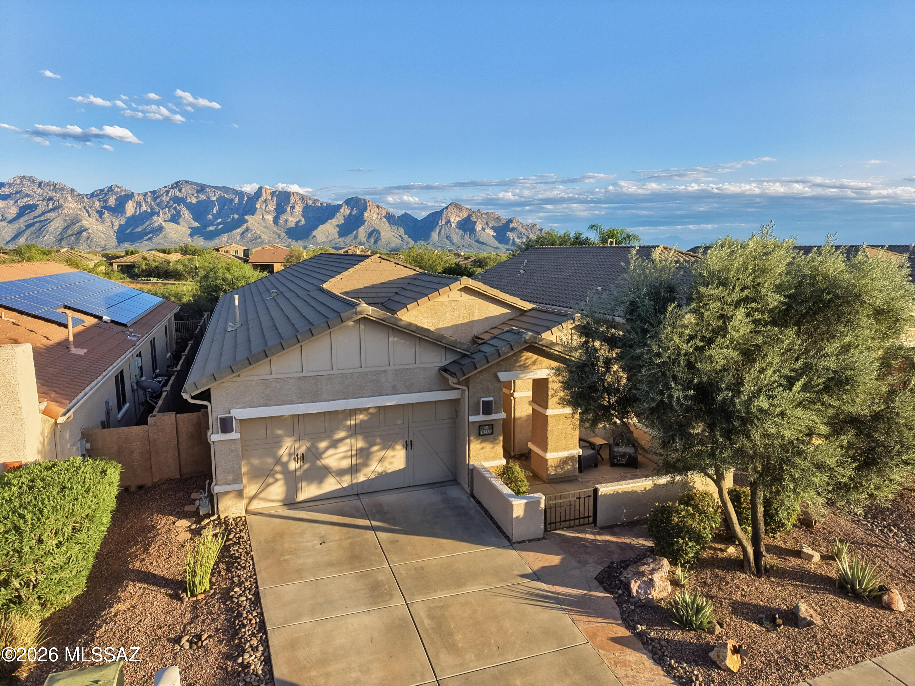 Beautifully situated with panoramic Catalina Mountain Views

Welcome to this exceptional one-owner home in highly sought-after Rancho Vistoso. This spacious 3 BR, 2BA home with a large office features the popular 2007 Pulte Sovana floor plan and offers an open, bright, and inviting living environment. 

The spacious kitchen features oversized cabinetry and opens seamlessly to the main living area, complete with a gas fireplace and beautiful views beyond. Step outside to the shaded patio and enjoy the peaceful setting overlooking natural desert green space.. Enjoy walking and biking on the Nature Preserve easily accessed  Panoramic views of the Catalina Mountain provide a stunning backdrop and an incredible sense of privacy and tranquility.

Ideally located near recreational parks, golf, fitness, entertainment, dining, shopping, and the Oro Valley Marketplace, this home offers both a wonderful lifestyle and an unbeatable location.

With its desirable flood plan, exceptional views, natural light, privacy, and proximity to everything Oro Valley as to offer, this is a home you won't want to miss.