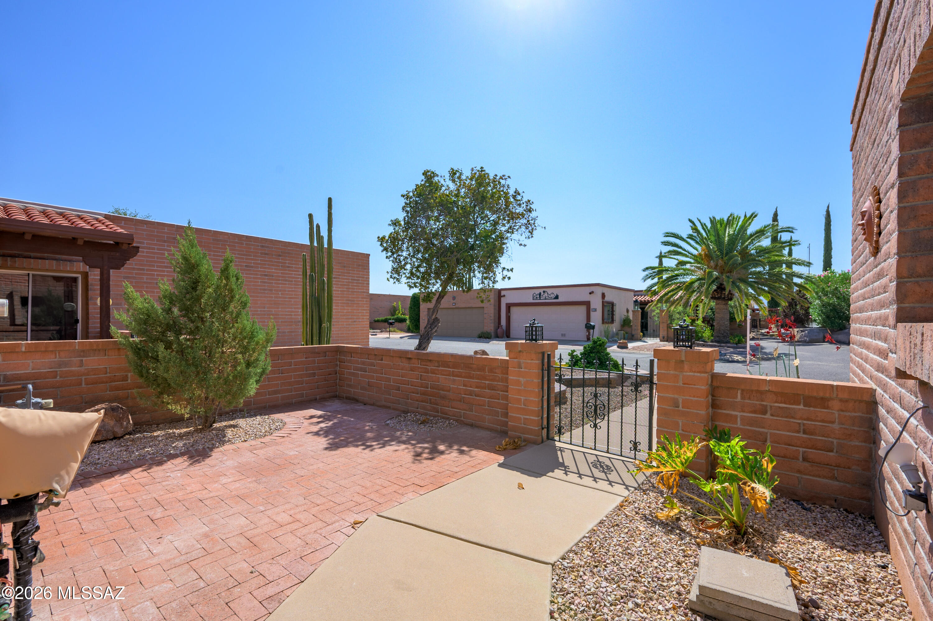Tucked away on a quiet cul-de-sac in Desert Hills No. 5, this charming townhouse welcomes you home from the moment you step through the inviting courtyard and enclosed entry. It's the perfect place to slow down, relax, and enjoy the easy desert lifestyle you've been dreaming of.
Designed with comfort and privacy in mind, the split-floorplan offers two spacious bedrooms and two baths, making it ideal for hosting family and friends while giving everyone their own private retreat. Offered partially furnished, you can begin enjoying your new home almost immediately.
A whole-house water filtration system provides clean, quality water throughout the home while helping protect your plumbing for years to come. Step outside to the screened porch, where you'll find a generous storage area... for all your extras. The covered patio is the perfect spot to enjoy your morning coffee or unwind with an evening beverage. If you've been searching for peaceful living with comfort and convenience you have found it. Come make this YOUR "Home Sweet Desert Home!"