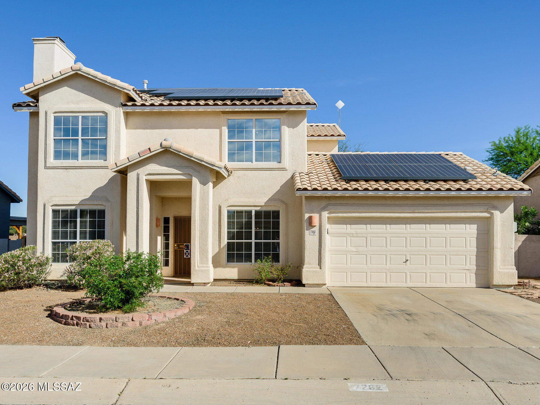 Welcome Home! From the moment you walk through the front door, you will love everything that this home has to offer. Immediately you will notice the updated luxury vinyl plank flooring, offering both style and durability. Upon entry you have a spacious living room centered around a cozy gas fireplace that makes the room feel welcoming and inviting. You also have space for a formal dining area or it could be used for a home office. As you enter the family room you will notice the soaring ceilings and expansive windows that fill the home with an abundance of natural light; creating a bright, open, and airy home that feels spacious. The kitchen is stunning and timeless and features a pantry, stainless steel appliances, and a kitchen sink beneath a window that looks into the backyard. Upstairs the primary suite offers a comfortable retreat complete with a walk-in closet, dual sink vanity, and a walk-in shower. The two additional bedrooms are also upstairs. New roof installed June 2025! Outside you will love the generously sized backyard with no rear neighbors. Take in beautiful mountain views and embrace the best of Arizona living in your own backyard. Located in the highly sought-after Continental Ranch community, this home offers convenience, comfort, and charm all in one. Schedule your showing today!