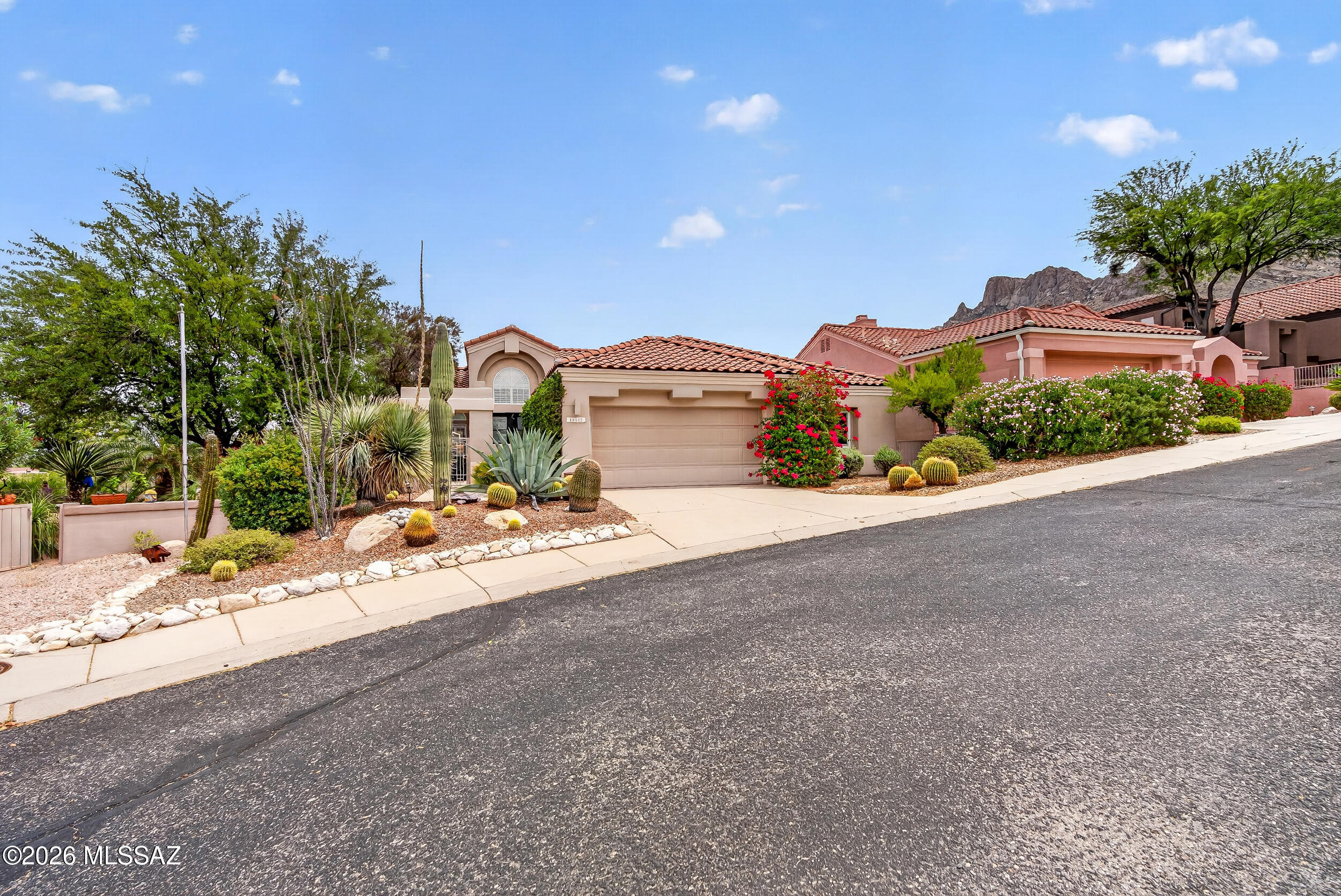 Bright and Spacious 3bed/2.5bath home located near the top of La Reserve. Guard gated community. Outstanding ridge top elevated cul-de-sac lot with gorgeous canyon and Catalina Mountain views. Inviting gated front entry courtyard with brand new front French door. Spacious kitchen with quartz counter tops, island, huge pantry, Stainless appliances, and breakfast nook. Huge living room with cozy gas fireplace and formal dining area. Huge primary suite with access to patio, double vanity, separate shower and tub, and walk in closet. Spacious guest bedrooms with Jack and Jill bath. Entertainers backyard with built in BBQ, bar, and gas firepit overlooking canyon and Catalina Mountain views. Must see!