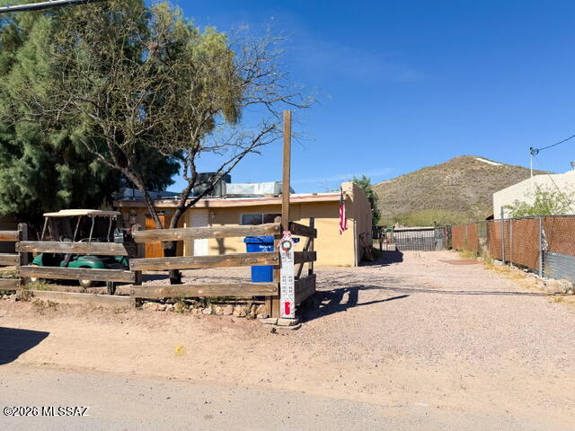 Great fix-up opportunity located in Tucson's historic Barrio Kroeger Lane with fabulous views of A Mountain!! Spacious lot with R-2 zoning close to freeway, schools, restaurants, parks and downtown.