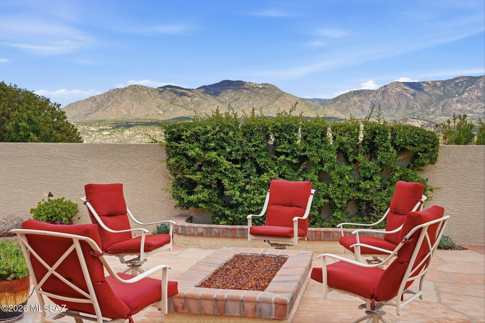 Magnificent Catalina Mountain Views from this Exceptional, Highly Upgraded Cambria Model w/3 Bedrooms, 2 Baths + Sizeable Office w/Swiss & Martin Custom Built-in Furniture. Gorgeous Custom Glass Front Door. Chef's Kitchen Features 5 Burner Wolf Cooktop, High End Appliances, Quartz Counters, Custom Soft Close Cabs & Elec Shade. Stunning Fireplace in Living Room. Remodeled Bar w/Wine Cooler, Fridge, Blanco Sink, Wine Storage. Fully Remodeled Large Master Suite w/Granite Counters, Large Walk-In Shower, Framed Mirrors, Walk-In Closet w/Built-in Cabs. Amazing Backyard w/ Built-In BBQ w/Tile Top Counter/Bar, Heated Saltwater Spool, Cozy In-Ground Gas Fire Pit. Newer Roof, HVAC, H20 Heater, Nuvo System & 14 New Windows. This is Truly an Exquisite Property & an Entertaining Paradise!