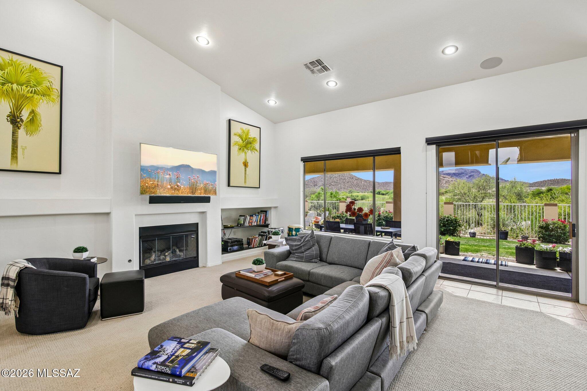 This Starr Pass-Quail Ridge executive home awaits you and your family. The desirable split floor plan features a large, updated primary suite on one side of the home and three additional bedrooms on the other, offering both privacy and functionality.
A grand two-story entry opens to a lofty dining room and a spacious den with double doors, then flows seamlessly into the bright, open great room. From here, enjoy stunning views overlooking the JW Marriott's Arnold Palmer-designed golf course, framed by a beautiful mountain backdrop. Just off the great room is a very large, airy chef's kitchen, also showcasing gorgeous golf course and backyard views.
The backyard is flat and level, featuring a lush grassy area and a perfectly situated sitting space, ideal for enjoying Tucson's glorious