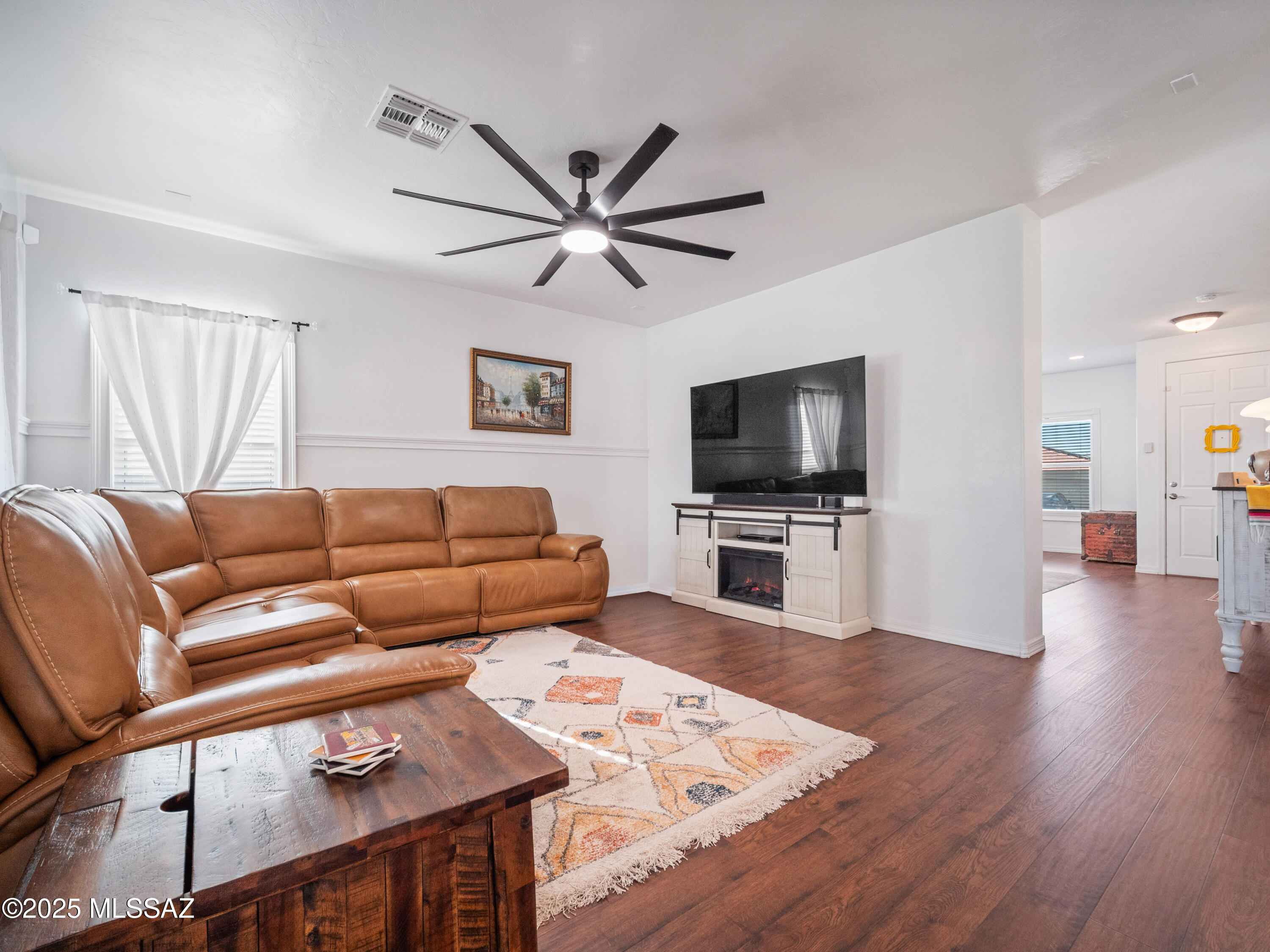 MOTIVATED SELLER! Skip the builder-grade finishes and post-closing upgrade costs — why settle for a cookie-cutter new build? This established home offers thoughtful upgrades, quality finishes, mature landscaping, and a beautifully developed community from day one.

This move-in ready oasis is priced to sell and ready for action. If you've been waiting for the right home with upgrades, location, and an unbeatable financing opportunity — this is it.

Perfectly positioned near  grocery store, multiple dining options and just minutes from dining, shopping, and entertainment at the Oro Valley Marketplace, this 2,344 sq. ft. designer-upgraded home delivers lifestyle, convenience, and value.

Step inside to modern elegance featuring updated lifetime laminate flooring and a recently... renovated show-stopping kitchen with white quartz waterfall counters, subway tile backsplash, farmhouse sink, and premium finishes throughout. 
This home is immaculate and truly turnkey, offering a spacious 3-bedroom, 2.5-bath w/ large loft and closets layout. Loaded with upgrades including a smart thermostat, security system, updated wall sconces, ceiling fans, and Venetian blinds.
Out back, your private desert retreat awaits. Cool off in the sparkling pool with an updated variable speed pool pump and Barracuda skimmer. Upgraded smart irrigation controller, new sprinkler and valve system. Relax under the covered patio ready for misters and surround sound and take in the stunning mountain views the ultimate Arizona lifestyle.

The garage is equally impressive with a new belt driven smart garage door opener, level-two door, updated tracks and bracing, and a 220V EV charger.

BONUS: ASSUMABLE FHA LOAN AT 3.875% (must qualify) an exceptional opportunity in today's market!