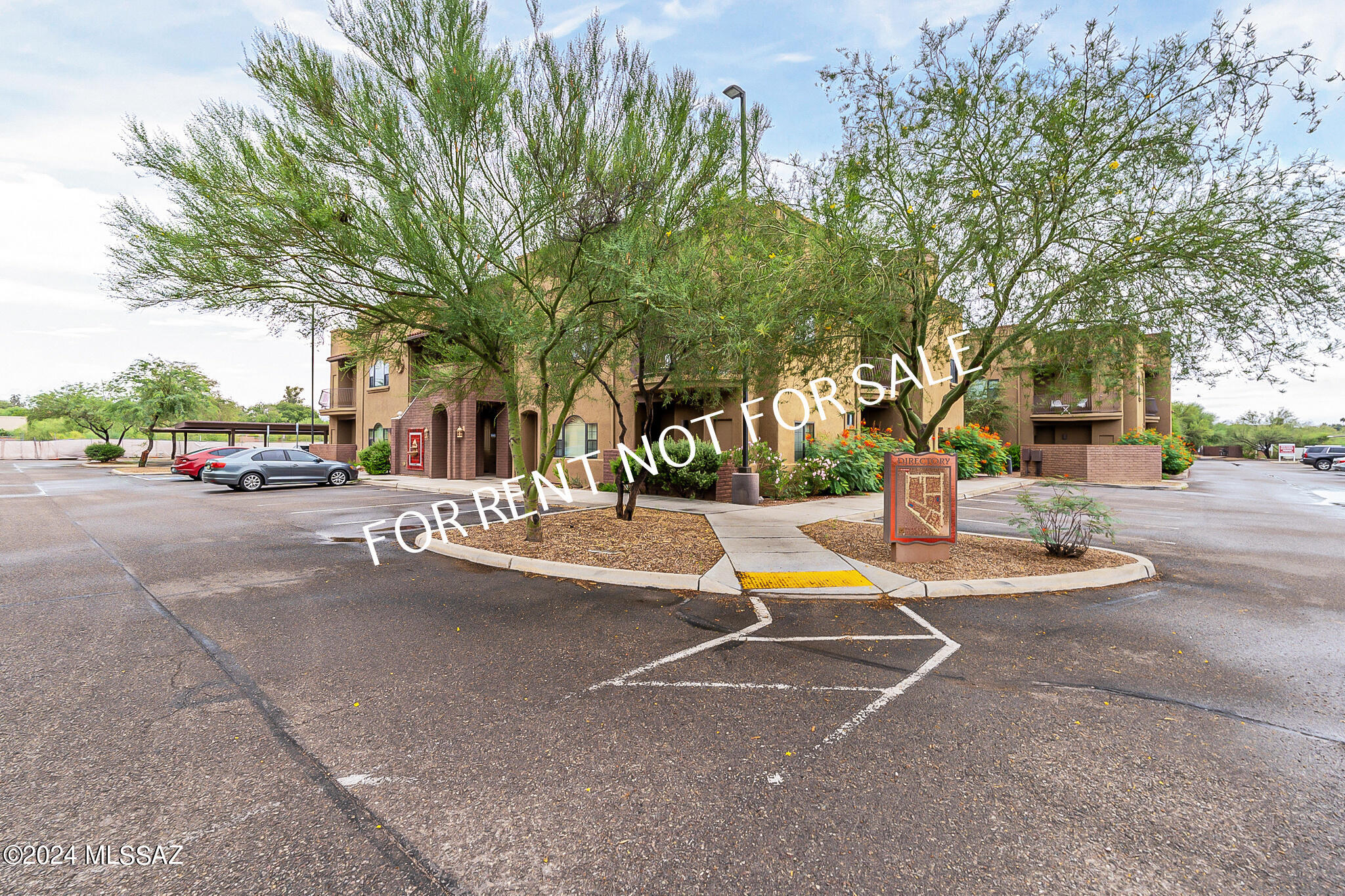 Built 2007 - Placita Escondida Condominium - 2 Bedroom, 2 Bathroom | 1,023 Sq. Ft. | Upstairs Unit. Built in 2007, this bright and well-maintained upstairs condominium is located in the desirable Placita Escondida community. Offering 2 bedrooms, 2 bathrooms, and 1,023 square feet of living space, this home features an open and inviting floor plan with neutral finishes throughout. The spacious great room flows seamlessly into the dining area and kitchen, which offers granite countertops, a breakfast bar, refrigerator, electric range/oven, built-in microwave, and dishwasher. The main living areas feature beautiful travertine tile flooring, while both bedrooms are comfortably carpeted. Additional features include: Full-size washer and dryer in a dedicated laundry room, Two private balconies, Two exterior storage units, One single-car garage, One covered parking space. Water, sewer, and trash services included. Residents enjoy access to the community pool and an excellent location adjacent to the Rillito River Park walking and biking path, with shopping, dining, and entertainment just moments away at St. Philip's Plaza. Pets are subject to approval. Limit one animal under 25lbs.

**Please visit our website for SECURITY DEPOSIT, PET RENT, & NON-REFUNDABLE PET FEE INFORMATION.