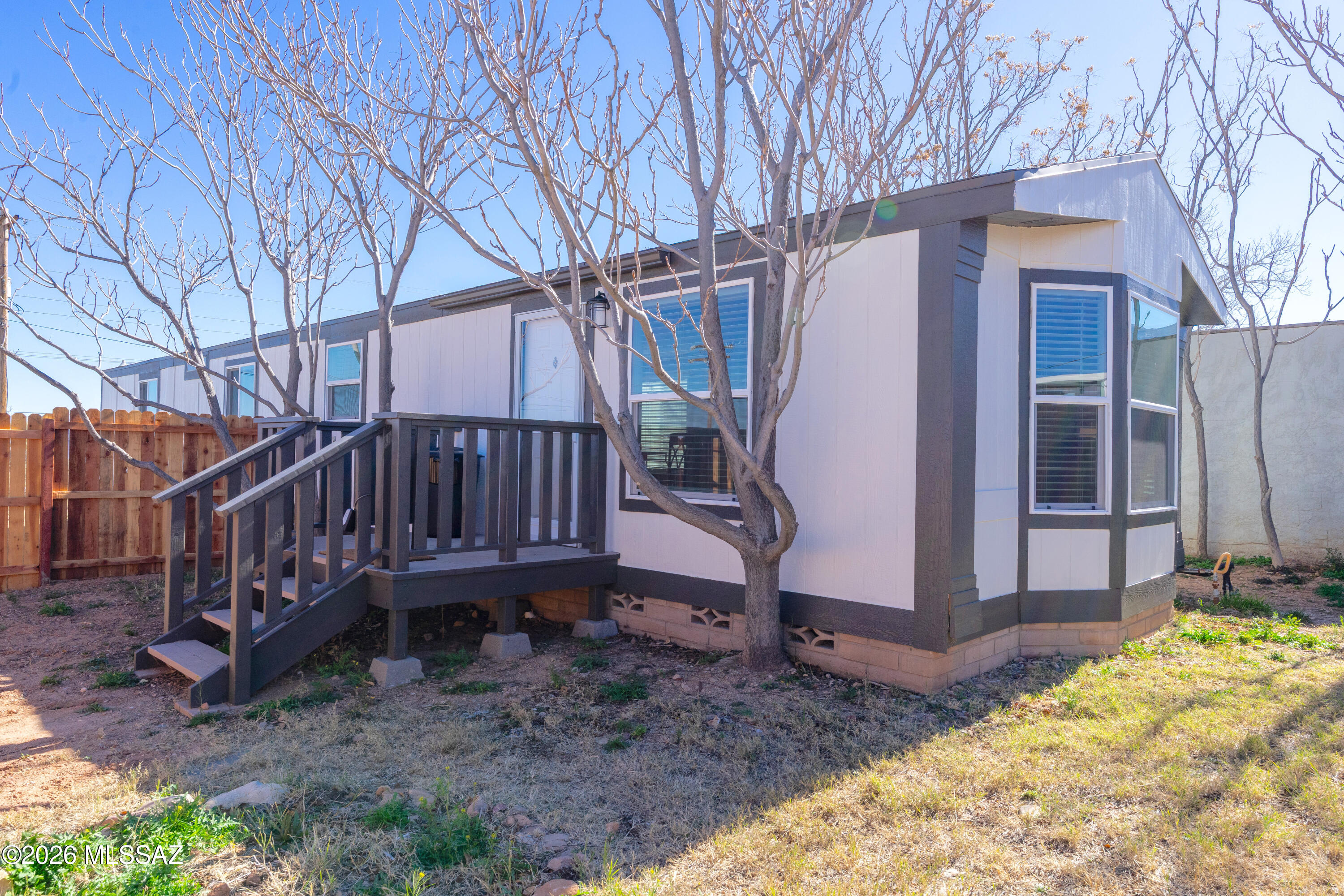 Beautifully REMODELED ''MOVE IN'' Ready home! 2BD 2BA home. BRIGHT & Open great room floorplan with brand new cabinets, quartz countertops, LVP flooring throughout, and Brand NEW windows. Brand new privacy fencing. For the NATURE enthusiasts this home is located at the base of the Huachuca Mountains for easy access to hiking, birding, trail running and more! Excellent location for a Vacation Rental. Furniture currently in the home conveys. MUST SEE home!