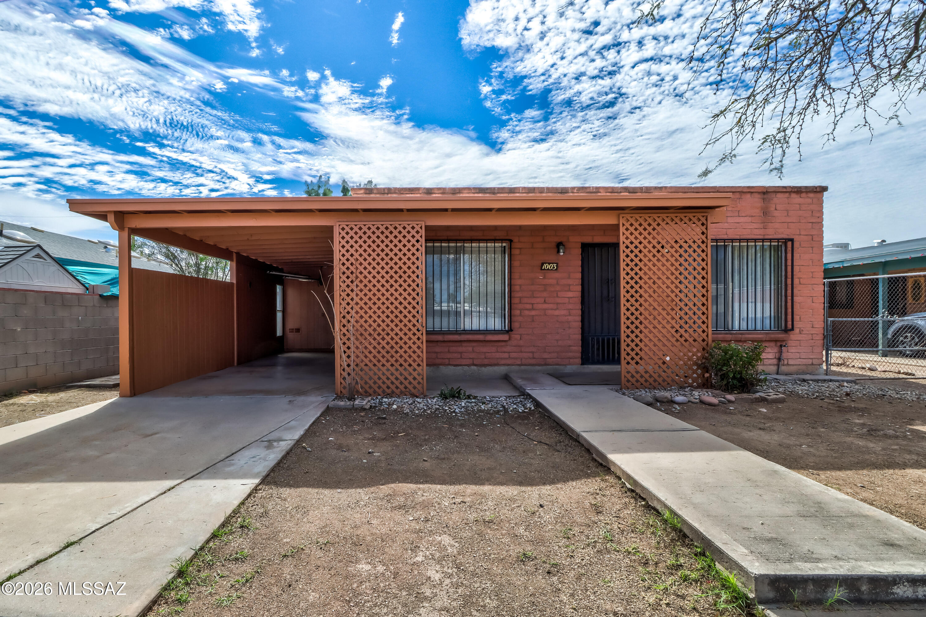 Charming home located in Riverside Walk near Barrio Hollywood. Just west of I10, makes it extremely convenient to get on the freeway. New exterior paint. Plenty of storage with two attached storage rooms and a spacious back yard ready for all your needs. Homes is fenced in for extra  privacy and/or your pets. Park located within walking distance to enjoy the Bike path, walking trail and play area. Schedule your showing TODAY!!!