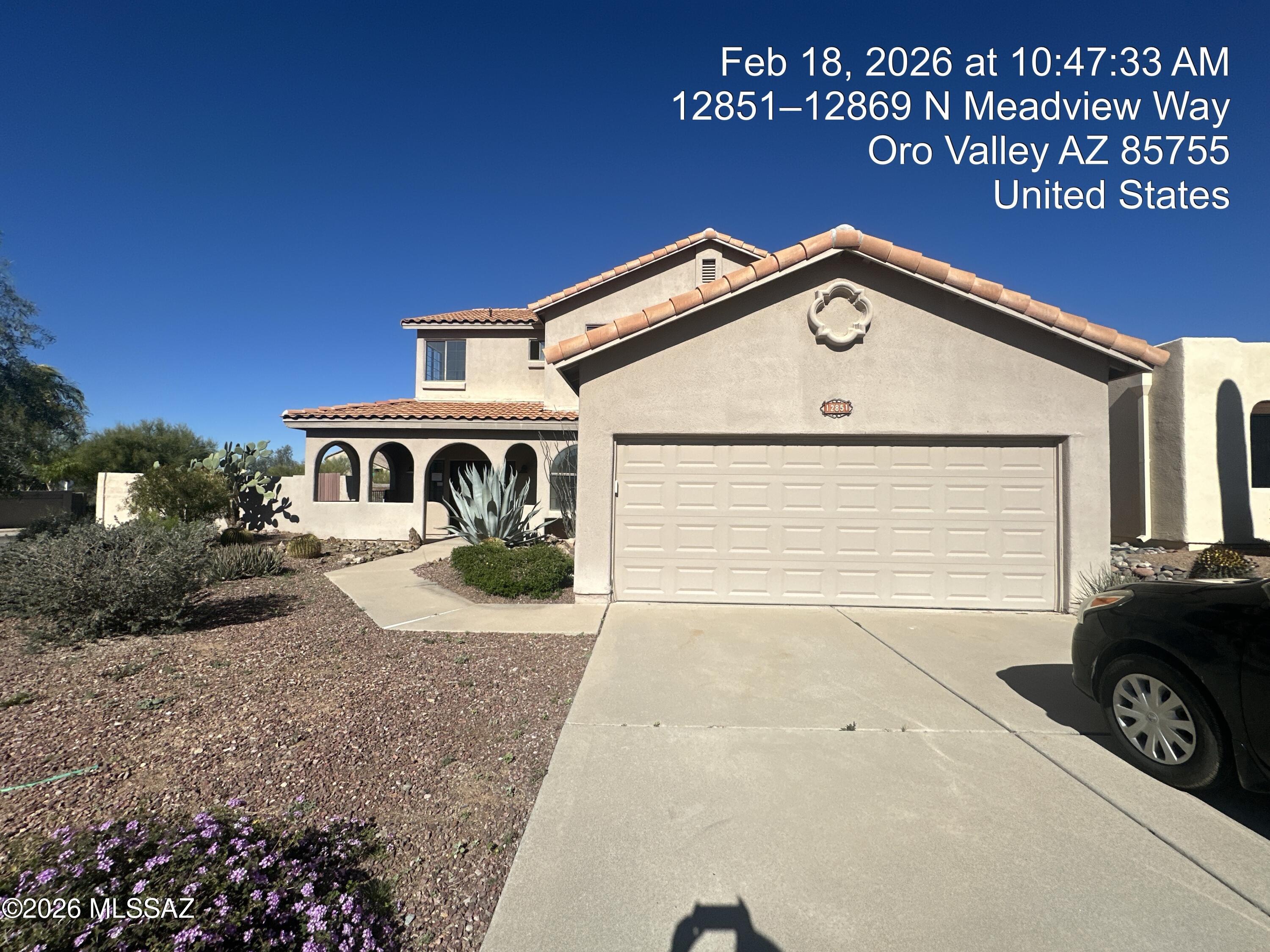 Two story home with a finished basement and private swimming pool.