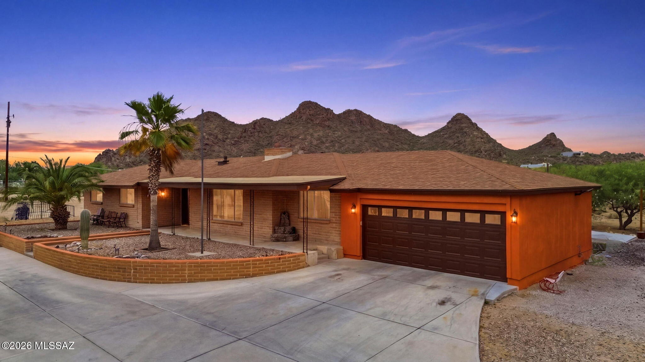 Desirable Southwest Tucson property offering 4.9 acres on a corner lot with NO HOA! Enjoy stunning mountain views, breathtaking Arizona sunrises and sunsets, and endless possibilities with space for horses, toys, RVs, or future additions. This spacious property features 4 bedrooms, 2 full bathrooms, a 2-car garage, and a large shed perfect for storage or horse corrals. Inside, you'll find updated bathrooms, beautifully updated kitchen cabinets, and plenty of storage space throughout the home. Rare opportunity to own usable acreage in one of Southwest Tucson's most sought-after areas while still being conveniently located near shopping, dining, and freeway access.