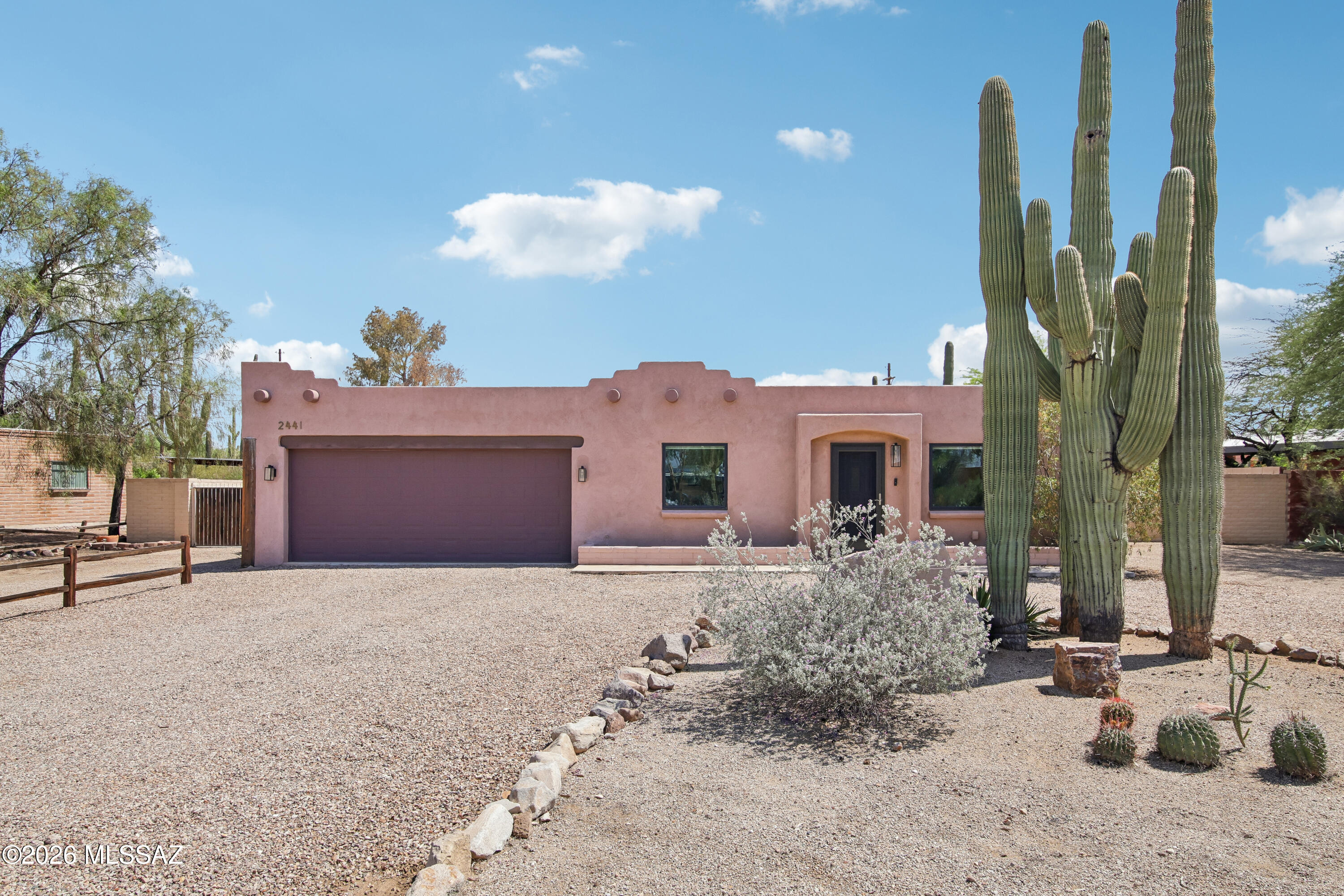 Priced $490,999-$505,999.

This house comes with a REDUCED RATE!! This is a seller paid rate-buydown that reduces the buyer's interest rate and monthly payment. Terms apply, ask your agent for more info!

Incredible, almost half-acre property, NO HOA! The beautiful 3BR/2BA main home pairs with a detached guest house (1 or 2 rooms, 2 baths) Perfect for multigenerational living, guests, office, or passive rental income.

The main home features an open floor plan, a spacious kitchen with stainless appliances, double ovens, and ample cabinetry. The primary suite offers dual vanities and a custom tiled walk-in shower. The 0.46-acre lot has a 13-ft gate, 50-amp sub-panel to plug in your RV, room for boats,RV, toys AND enough space for a future pool and workshop. 

The property includes affordable, sufficiently-sized leased solar, upgraded electrical, new HVAC, new water heater, and more!

Beautiful Westside location, minutes from Downtown Tucson, U of A, and I-10!