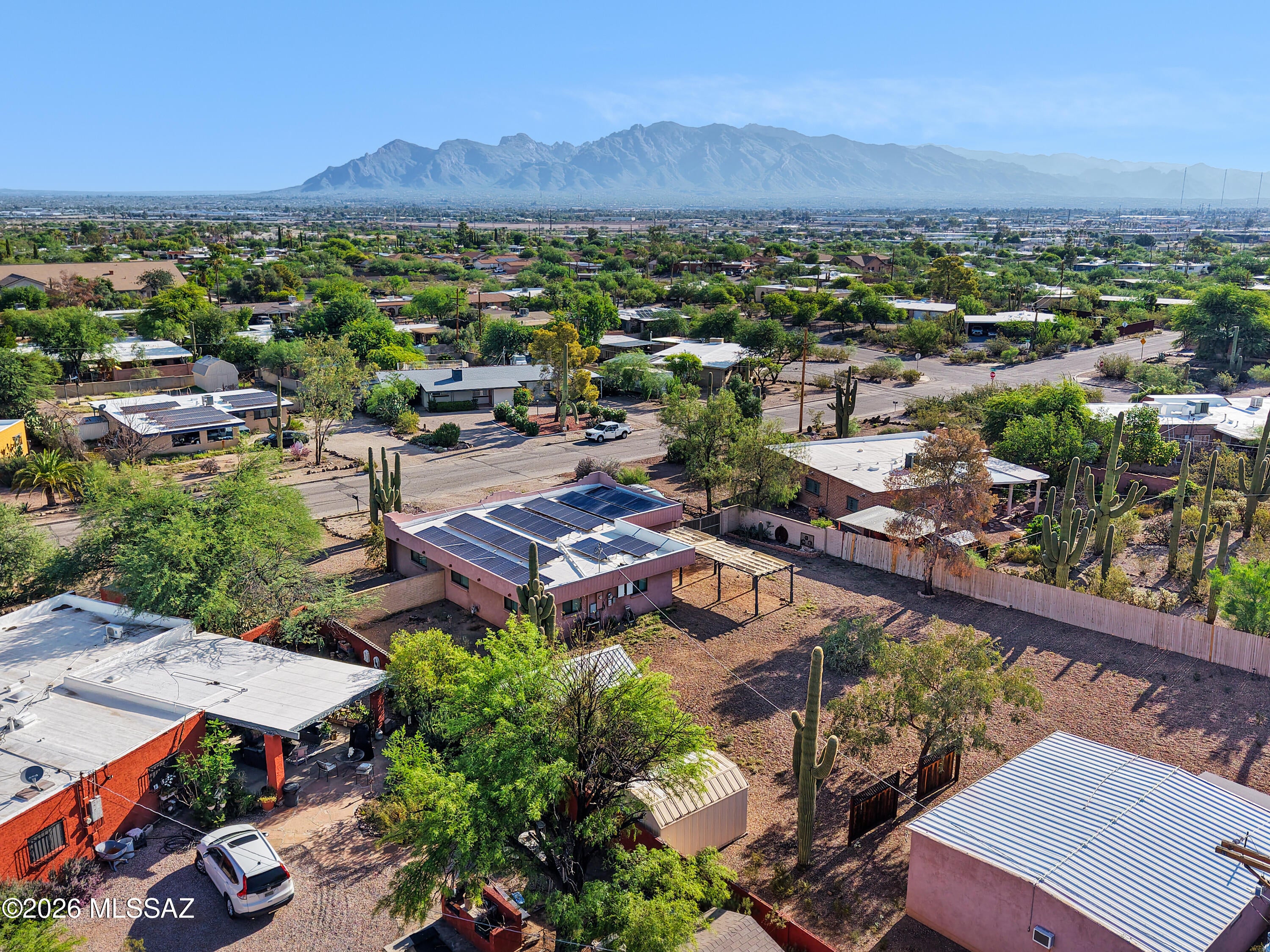 Priced $491,999-$506,999.

This house comes with a REDUCED RATE!! This is a seller paid rate-buydown that reduces the buyer's interest rate and monthly payment. Terms apply, ask your agent for more info!

Incredible, almost half-acre property, NO HOA! The beautiful 3BR/2BA main home pairs with a detached guest house (1 or 2 rooms, 2 baths) Perfect for multigenerational living, guests, office, or passive rental income.

The main home features an open floor plan, a spacious kitchen with stainless appliances, double ovens, and ample cabinetry. The primary suite offers dual vanities and a custom tiled walk-in shower. The 0.46-acre lot has a 13-ft gate, 50-amp sub-panel to plug in your RV, room for boats,RV, toys AND enough space for a future pool and workshop. 

The property includes affordable, sufficiently-sized leased solar, upgraded electrical, new HVAC, new water heater, and more!

Beautiful Westside location, minutes from Downtown Tucson, U of A, and I-10!