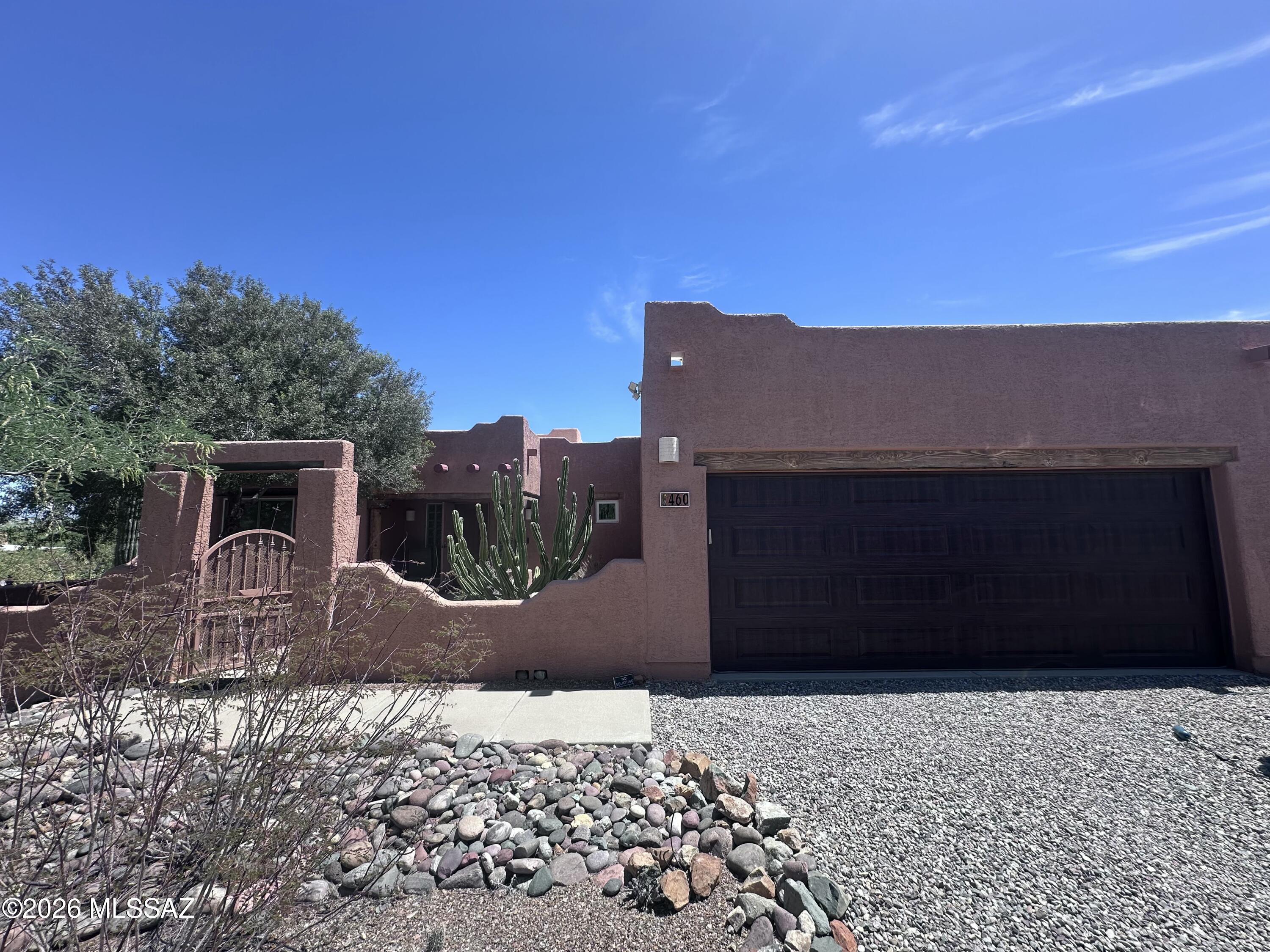 Situated on 1.185 acres, this inviting Southwestern-style home has stunning mountain views and an east-facing backyard designed to capture beautiful sunrises. The spacious covered patio and low-maintenance landscaping create an ideal setting for outdoor enjoyment.

A welcoming front courtyard leads into a thoughtfully maintained 3-bedroom home featuring an owned solar system, newer Andersen windows and sliding doors, and a 3-car garage with abundant storage and built-in cabinetry.
The primary bathroom has custom tile finishes, quartz countertops, upgraded cabinetry, a soaking tub, and a large walk-in shower. The kitchen has also been updated with custom cabinetry and quartz counters, providing both style and functionality.
No HOA.