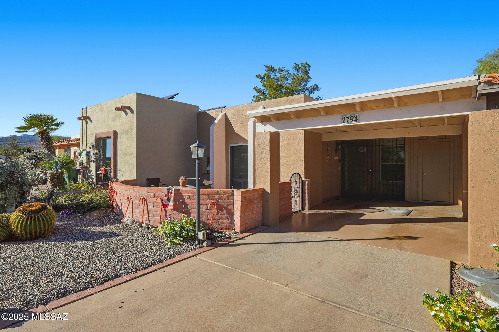 Glorious mountain view from the front patio of this charming 2 bedroom 2 bath townhome in Desert Hills 2. This townhome has a bonus room with it's own mini split for your comfort. This townhome has all tile floors, a new tub/surround in the guest bath, a freshly painted bonus room, exterior was painted in 2023, roof was recoated in 2023 and a new skylight was installed then as well. Mini split in bonus room was installed in 2019 and the HVAC was replaced in 2014. This lovely home has been wonderfully taken care of and is a must see.