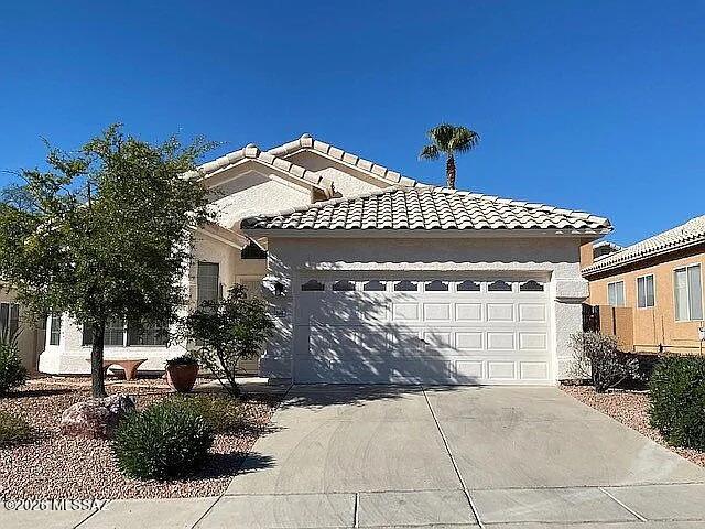End of the cul-de-sac in a highly sought-after location! Come see this lovely 3 bedroom ranch home within walking distance of Sabino Canyon... enjoy an open floorplan with a lovely fireplace, stainless steel kitchen appliances, and vaulted ceilings with tons of natural light.  The primary bath has a double vanity, separate shower, soaking tub and walk-in closet.  Enjoy cool autumn evenings and summer barbeques in your large walled-in yard featuring mature palm and mesquite, low-care landscaping, outdoor lighting and two patios! Tons of garage storage and brand new carpet, roof, paint, and more! Jump on this one while you can!