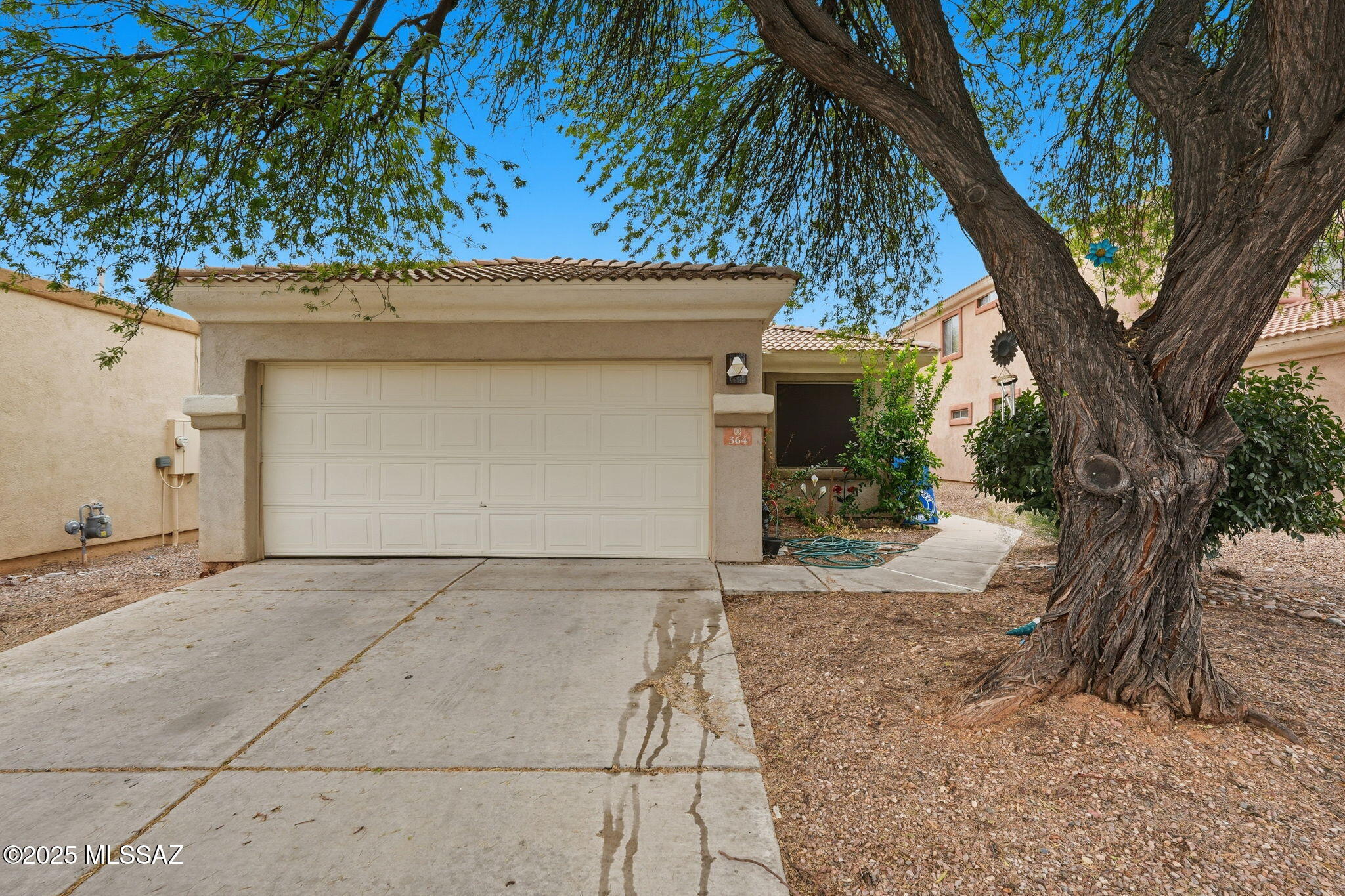 Discover an incredible opportunity in the highly sought-after Rancho Sahuarita community with this short sale property at 364 E Camino Rancho Redondo. This 3-bedroom, 2-bath home is priced well below market value and offers instant potential for the right buyer, investor, or homeowner willing to bring their vision and finishing touches. The home needs cosmetic updating, but the bones are solid and the upside is huge. Located in one of the most desirable master-planned communities in Southern Arizona, you'll enjoy access to amazing neighborhood amenities, beautiful parks, lakes, walking paths, pools, clubhouse, and more. Whether you're looking for an investment, a flip, or a home you can personalize over time, this discounted property delivers immediate value in today's market! This sale is contingent upon the short sale approval.