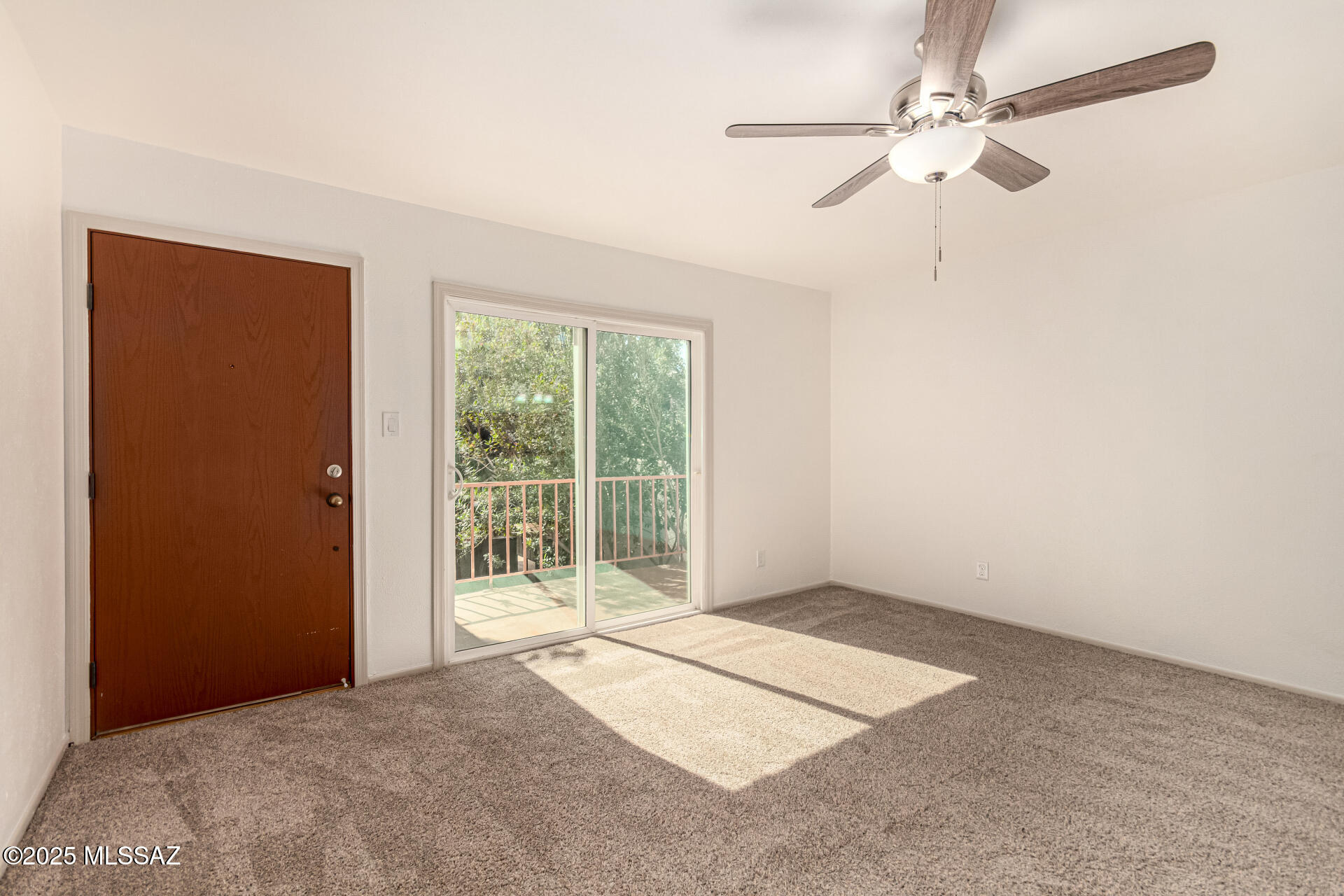 Move-in ready unit in desirable La Colinas Condominiums! Bright, open living and dining area with a seamless layout. Enjoy new neutral paint, new plush carpet, updated light fixtures, and new ceiling fans. The galley kitchen features new track lighting, black counters, white cabinets, and a breakfast bar.  Elegant Black appliances includes electric range, range hood, dishwasher & refrigerator (As Is). Upstairs, the loft-style bedroom offers vaulted ceilings, great light, an ensuite bath, walk-in closet, and built-ins. Laundry room includes a stacked washer and dryer (As Is) and new luxury vinyl plank flooring extends through the kitchen, laundry, and bath. Relax on your private balcony or enjoy the community pools! A must-see! Agent/Owner