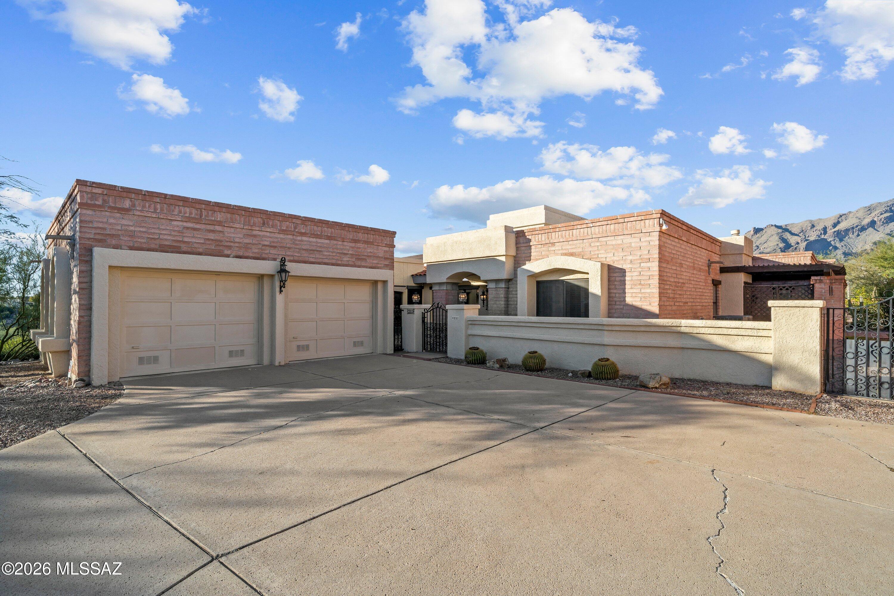 Stunning Mountain Views in Gated Pontatoc Canyon Estates. This light-filled home offers breathtaking north-facing mountain views and a private, beautifully landscaped backyard with mature trees, perfect for relaxing or entertaining. The thoughtfully designed floor plan features warm, inviting living spaces with a cohesive aesthetic throughout. A spacious living room flows seamlessly into the rest of the home, creating a perfect setting for gatherings.
The expansive primary suite includes a spa-like bathroom and a generous walk-in closet, offering a luxurious retreat. Located in the prestigious, gated community of Pontatoc Canyon Estates, this home is a rare find for those seeking comfort, style, and exceptional outdoor living.