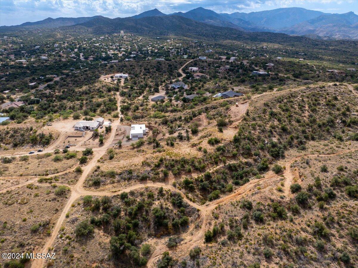 VIEWS, VIEWS, VIEWS, and opportunity await on this beautiful hilltop lot located in the heart of Oracle near 2 o'clock hill. Whether you're looking for a prime spot to build your dream home or seeking a future investment property, this parcel won't disappoint! Boasting .82-acre, water and power at the lot line, potential septic site identified, and potential home plans available, this property is an ideal starting point for immediate construction. This lot is conveniently situated with easy access to nearby highway 77, shopping, schools, and recreational hiking areas. This is fantastic opportunity in the heart of Oracle! Lot labeled C in the photos. the flexibility to build or expand as you wish. Parcel #308-19-090A  is .48 Acres & Parcel 308-19-050B is .54 acres, these adjoining lots can be added to the purchase contract for an additional $20,000 each. Want them all but need a deal? Seller financing available!! Come and make your dream a reality!