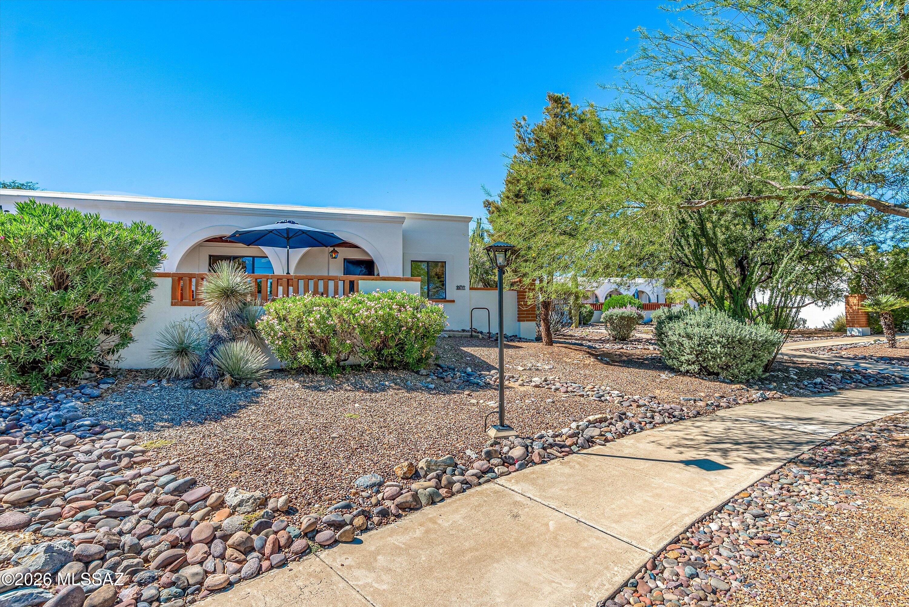 Enjoy easy, 55 plus Arizona living in this charming Southwest decorated fully furnished 2-bedroom, 1-bath home offering comfortable living space. The east facing patio provides a beautiful mountain view and a peaceful spot to enjoy your morning coffee or relax outdoors. Additional features include private laundry, a conventional pool steps away from your front door, park like grounds, close parking place, and restaurants and shopping within walking distance. Everyday living is convenient and comfortable. Located in desirable Green Valley Arizona. This property is an excellent opportunity for a full-time resident, winter getaway, or investment property. All furnishings are included in the sale of this home. 
Vacant GO SHOW!