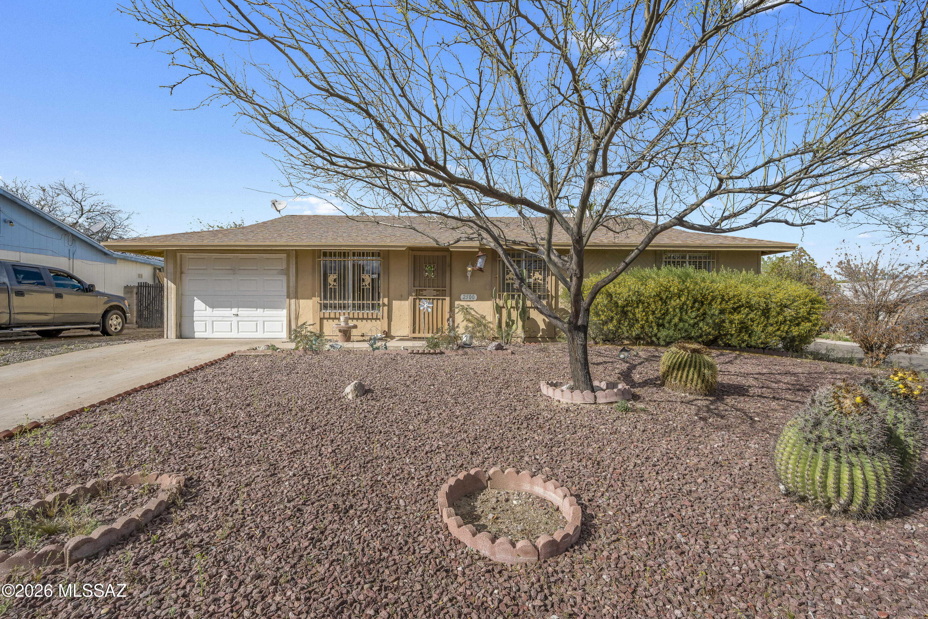 Clean, cozy, move-in ready home in quiet southwest neighborhood with 1-car garage and no HOA. Tile floor throughout. Fully enclosed back yard. Close to schools, shopping and restaurants.