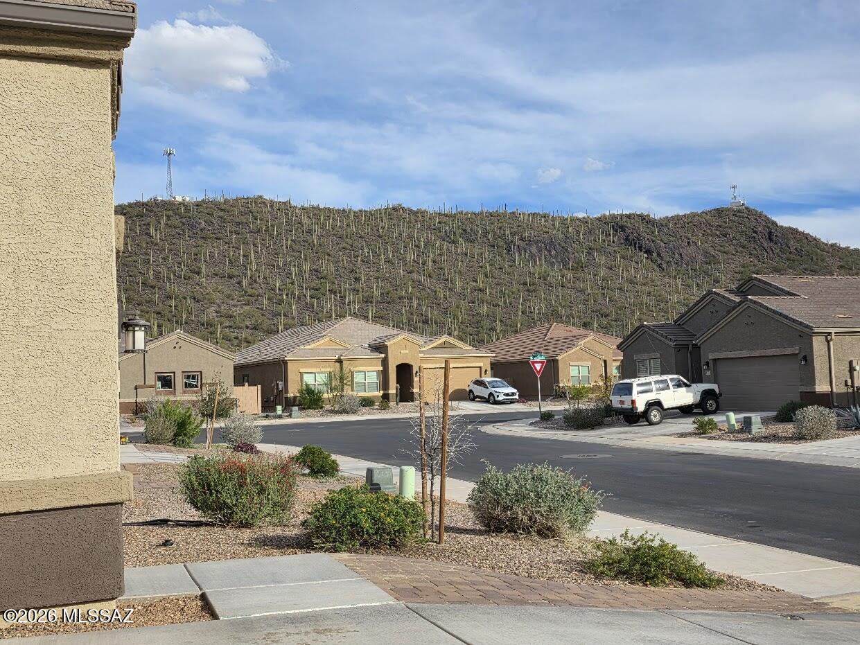 Mountain views come with this spacious and gorgeous 4 bedroom + a den, 3 bathrooms home in the desired Saguaro Bloom. Sunshades on all windows outside and faux wood blinds throughout. Low care backyard with large covered patio with extended pavers. Epoxy coated garage. Pets upon approval. No cats. Krasnick Realty represents the Landlord only on this listing.