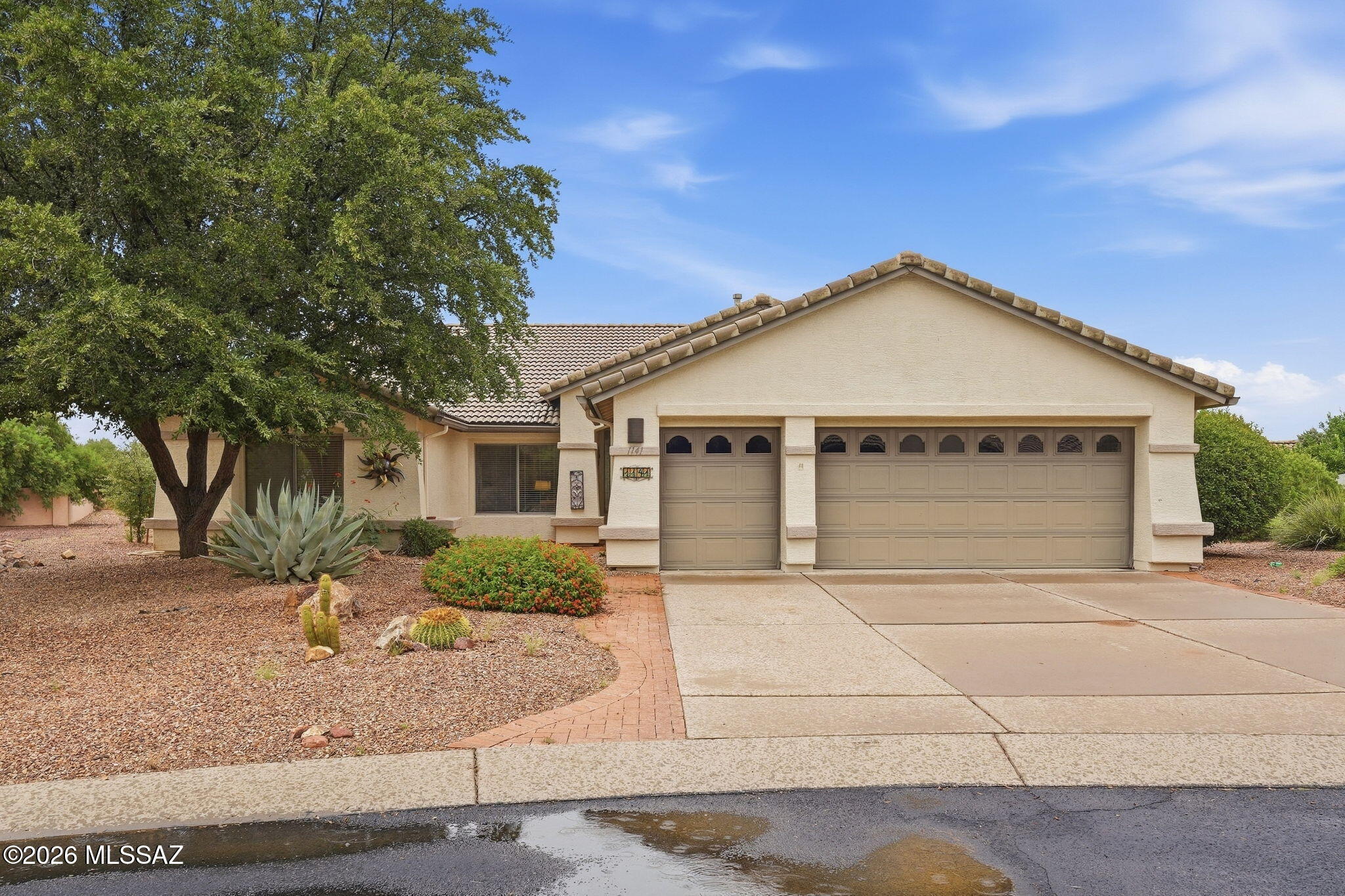 Welcome to easy Arizona living in gated Quail Creek, a Robson community! This spacious Montana plan features a bright, open floorplan, well-appointed kitchen with stainless appliances, wall oven/microwave and generous cabinetry, plus a separate office for work or hobbies. Retreat to the oversized primary suite with a large walk-in closet and direct access to the expansive covered patio-- and large backyard which is perfect for relaxing, entertaining and enjoying our beautiful desert weather. Beyond your door, pull the golf cart out of its own garage stall and go! Golf, pickleball, lunch at The Grill or meeting friends for a community activity-- less time maintaining, more time living! Come for the home, stay for the lifestyle and make this YOUR ''Home Sweet Desert Home!''