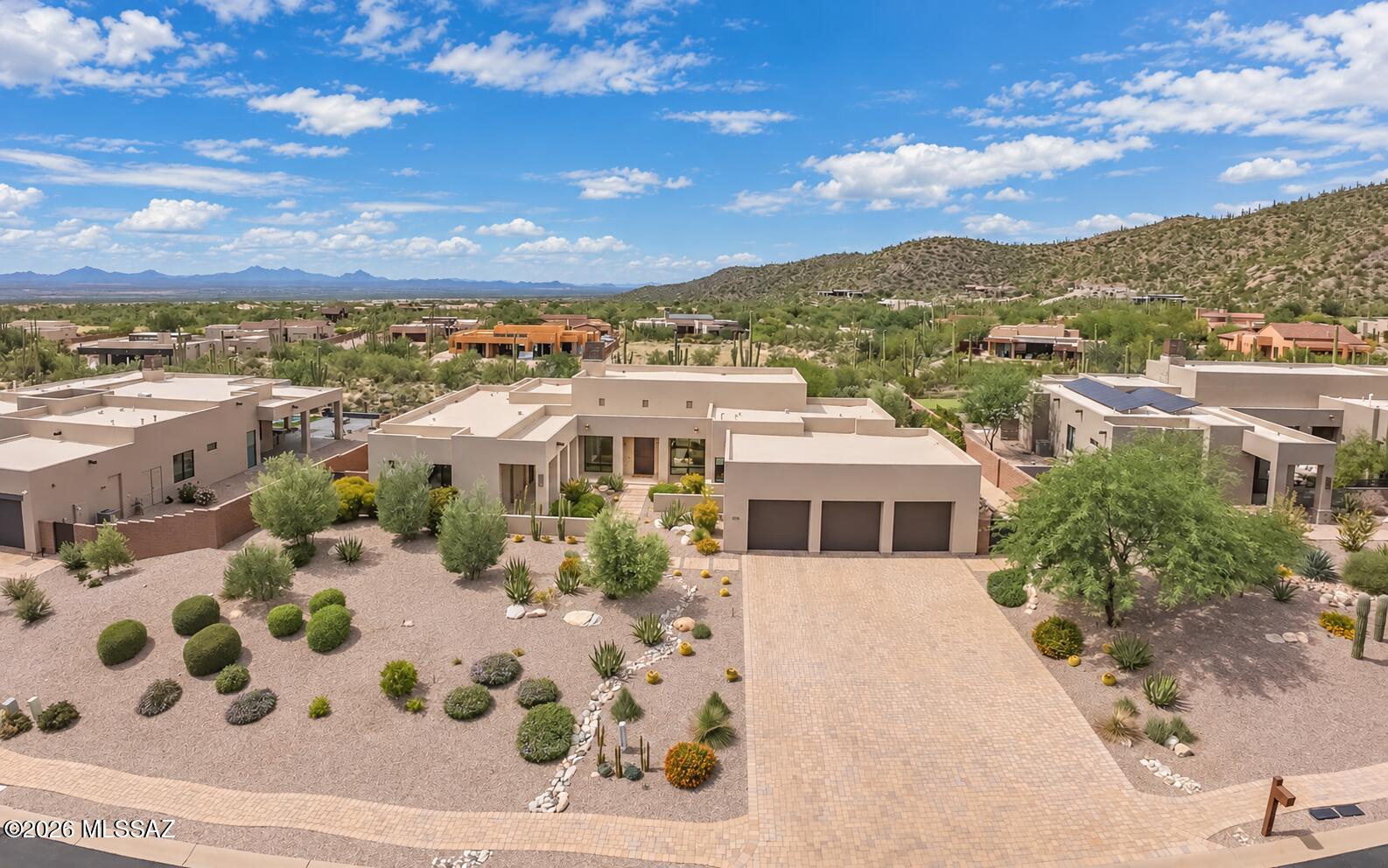 Come view the Epitome of Luxury Living within the Residences at the Ritz-Carlton, Dove Mountain.  Experience a higher level of luxury with unrivaled quality showcased in a bold modern style with impeccable character.  This residence promises to redefine your concept of luxury living, offering an exquisite blend of luxury, comfort and unparalleled craftsmanship.  Flooring is Cotto d'Este porcelain 24x48 imported from Italy. Casa Blanca Quartz countertops kitchen, wet bar and primary bathroom. The Fleetwood door slider folds completely into the wall for unobstructed panoramic views from your great room - ideal for entertaining - and the sunsets are draw-dropping mesmerizing! Gorgeous saltwater pool and spa w/firepit gathering seating invite you to enjoy what Southern Arizona is all about! Check into the fabulous golfing opportunity. 
Club 63 Full Golf Membership
The premier Membership at the premier Club in the Desert Southwest. Many, Many BENEFITS:
Unlimited access across 63 holes of the Desert Southwest's finest golf at The Gallery Golf Club and the Golf Club at Dove Mountain
Full access to The Gallery Sports Club and all amenities, including fitness & cardio, aquatics, spa, and court sports
Casual and Fine Dining options. No Food & Beverage Minimum.
 
Sonoran Desert living at Dove Mountain means enjoying outdoor living at its best.  Nearly one-third of Dove Mountain's 6,200 acres of desert splendor is being kept in perpetuity as natural open space.  That lovely "cooing" sound you hear in the evenings may be the gentle Inca Doves which live in the area and give this elegant enclave its name. Pima County's 3,000-acre Tortolita Mountain Park borders Dove Mountain to the north.  To the south is the 2,400-acre Tortolita Preserve, with its outstanding biking and hiking trails, designated to be permanently sustained by the City of Marana and the State of Arizona.

Nestled in the beautiful Tortolita Mountain Foothills, Dove Mountain is perhaps the epitome of Southwest desert living. The temperate climate allows residents to enjoy an indoor/outdoor lifestyle virtually all year-round, not just in in the fall, winter and spring seasons for which the region is famous.

You're undoubtedly familiar with the distinctive Saguaro cactus, exclusively found in the region. But, there is a wide variety of other natural vegetation to be found here, including Prickly Pear cactus, Desert Willow, Western Wildflower, Cave Primrose, Desert Lupine, the Ghost Flower, Devil's Claw and the Christmas Cactus, among other varieties. The wildlife of Dove Mountain is fascinating. The Sonoran Desert is home to species like the Great Horned Owl, the Golden Eagle, the Black-chinned Hummingbird, Gambel's Quail, the Hooded Oriole and the Cactus Wren, Arizona's official bird.

The lifestyle here is fascinating, mesmerizing, graceful, luxurious and fun.Perhaps your own Dove Mountain story is just beginning.