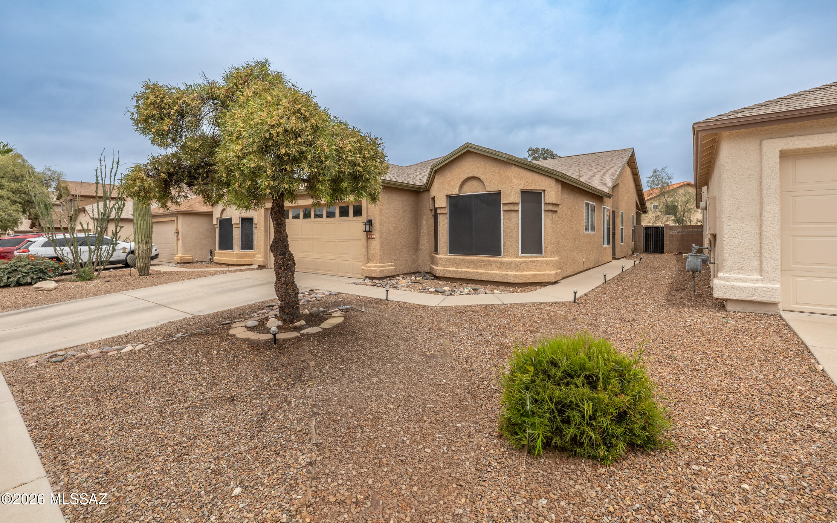 This wonderfully maintained 3 bed / 2 bath home in the desirable Rita Ranch community has lots to boast about: a split floor plan layout with good-sized bedrooms and bathrooms ensures privacy and functionality, an open kitchen with plenty of counter and cabinet space and a large pantry closet, central HVAC, plus a 2 car garage. The generously sized master suite has a large walk in closet, a garden tub to soak in, dual vanities for convenience and a BRAND NEW shower. The spacious backyard can be sectioned off to be pet friendly and has a covered patio. The turf in the backyard offers a nice touch of green and a great place for kids and animals to play - perfect for year round enjoyment. The shed conveys so you don't have to use the garage for storage. What else do you need?