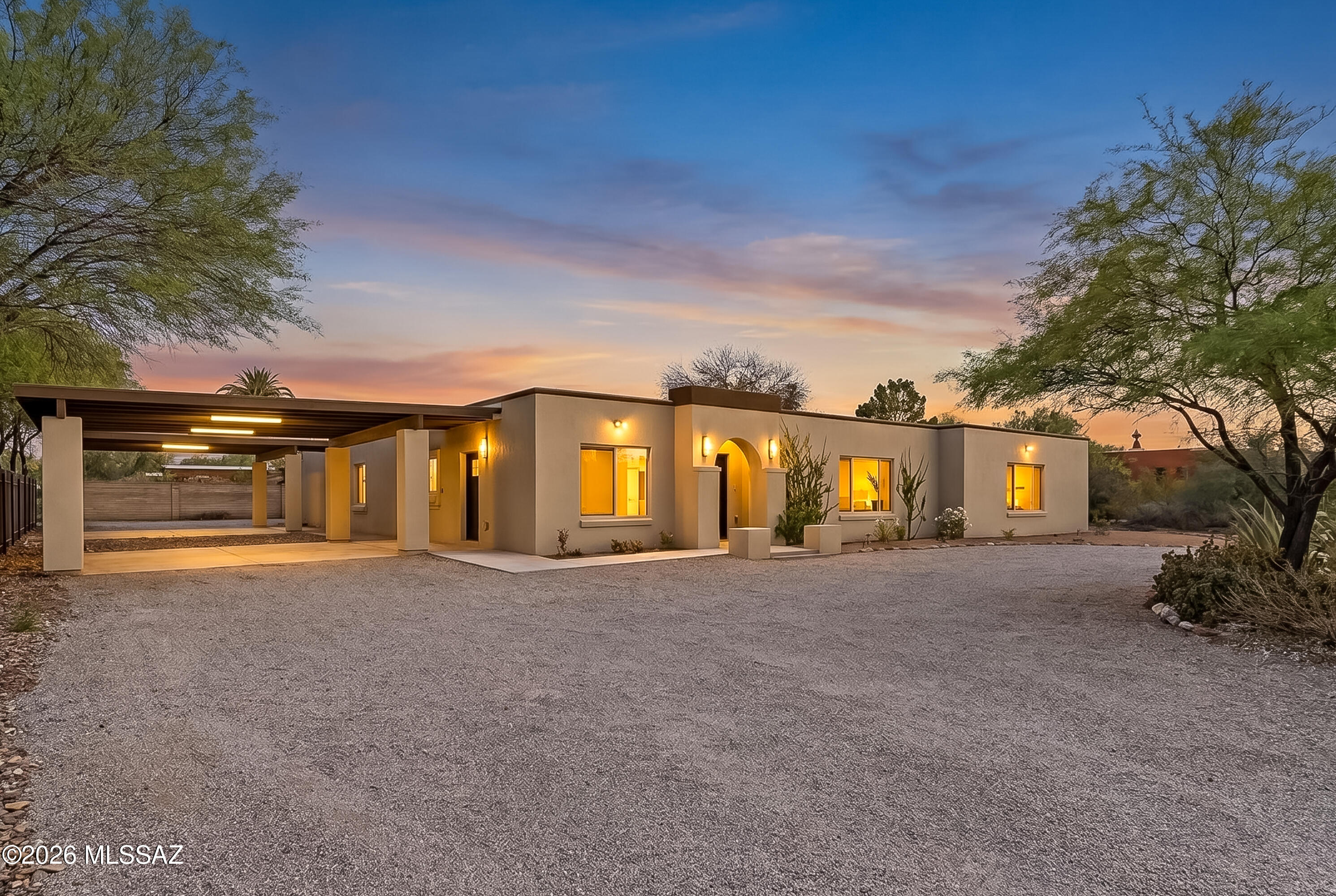 Welcome to this completely and stunningly remodeled 5-bedroom, 4-bathroom luxury home in the heart of Tucson with 3 potential residences. The thoughtfully redesigned layout provides incredible flexibility for multigenerational living, extended family accommodations, guest quarters, multifamily/AirBnB or Assisted Living potential. No stone left unturned with the quality remodel as all main components are new such as the Roof, HVAC, Milgard Windows, Stucco exterior, all doors, flooring, etc. This home boasts a Custom Alder Wood Kitchen in the main residence with Quartz countertops throughout. Luxury, flexibility, and endless potential come together in this remarkable, turn-key remodeled home--a rare opportunity to own a truly special property in the heart of Tucson. Owner/Agent