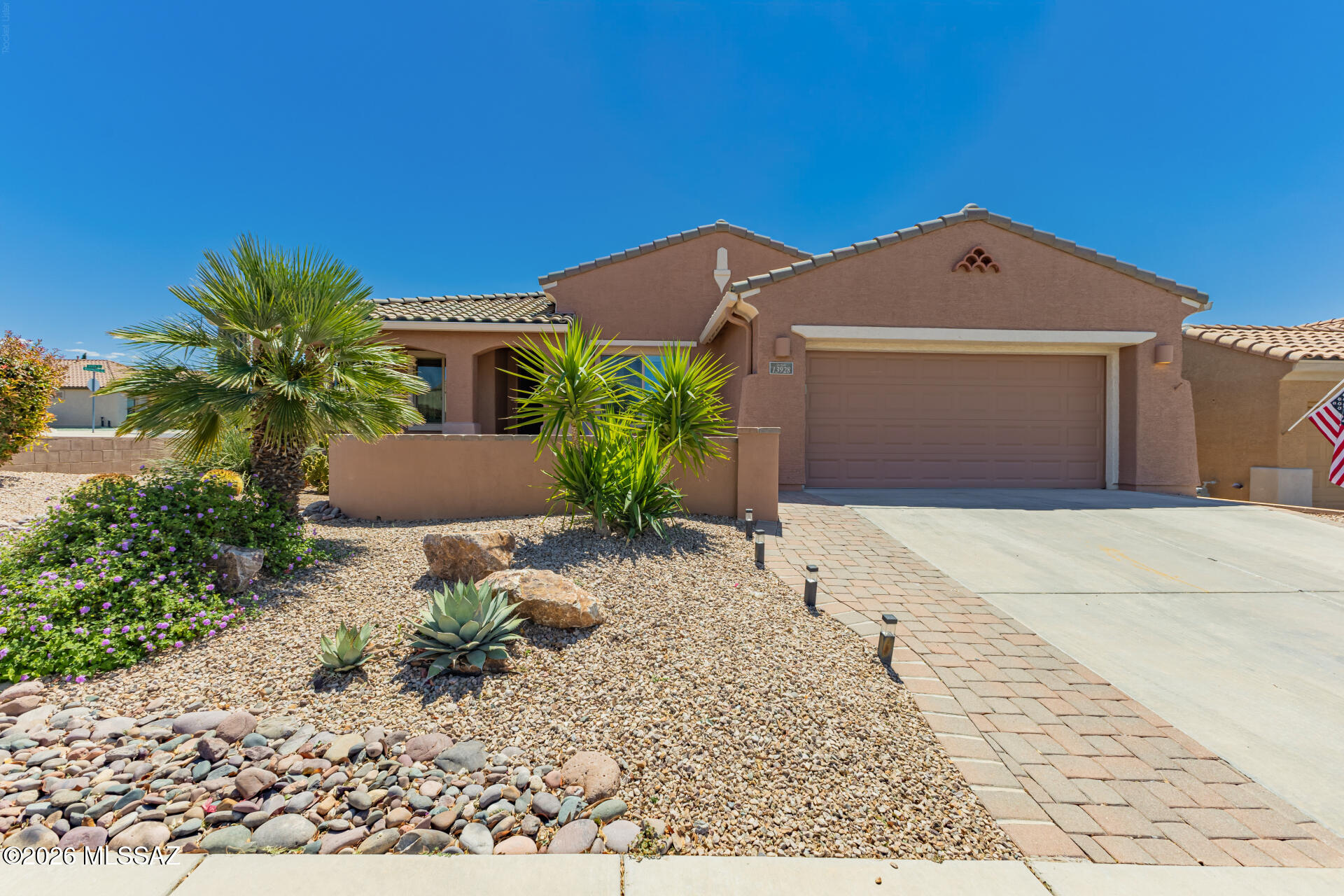Welcome to resort-style living in the highly sought-after Del Webb Four Seasons 55+ gated community. Set on a desirable corner lot with north/south exposure, this energy-efficient 3-bedroom residence offers a refined blend of comfort, function, and elevated Arizona living.
Inside, the home features fresh interior paint, tile flooring, plantation shutters, ceiling fans, and abundant natural light throughout. The inviting living and dining areas flow seamlessly into a spacious great room anchored by a charming beehive fireplace and pre-wired surround sound, creating a warm yet sophisticated setting for everyday living.
The well-appointed kitchen offers granite countertops, stainless steel appliances, a tile backsplash, pantry, ample cabinetry, center island with breakfast bar, and a breakfast nook with a built-in desk area. The primary suite provides a peaceful retreat with a walk-in closet and en-suite bath featuring a soaking tub.
Designed for effortless indoor-outdoor living, the backyard includes a covered patio, built-in barbecue, private courtyard, and storage shed. Additional highlights include a paved concrete driveway, wrought iron security door, smoke detectors, public water, natural gas, and connected sewer.
Residents of Del Webb Four Seasons enjoy an exceptional amenity package including a clubhouse, pool, spa, recreation room, fitness facilities, pickleball, tennis courts, basketball court, parks, gated access, security, common area maintenance, garbage collection, and street maintenance. A beautiful opportunity to enjoy low-maintenance living in one of the area's premier active adult communities.