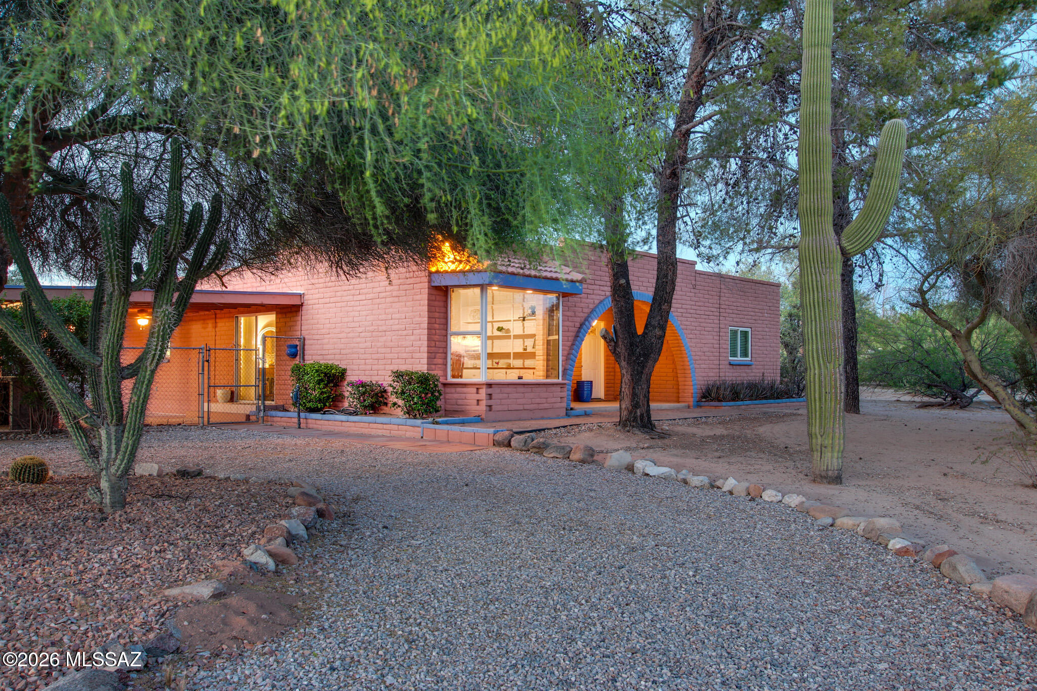 Two homes. One incredible property.

Set on 2.5 acres of stunning desert landscape, this rare estate offers the ultimate in privacy and flexibility. The main home features 4 bedrooms, 2 bathrooms, and 1,985 sq ft of thoughtfully designed living space with beamed ceilings, a beehive fireplace, and an upgraded kitchen. A spacious guest house adds 2 bedrooms, 1 bathroom, and 1,688 sq ft -- perfect for extended family, guests, or rental income.

A detached 1,600 sq ft garage with office space rounds out the package, while outdoor highlights include a covered patio, fully equipped outdoor kitchen, and sparkling pool. Horse-friendly zoning, sweeping desert views, and easy access to I-10 and the Outlet Mall make this Southwest retreat truly one of a kind. Multi-generational living has never looked this good.