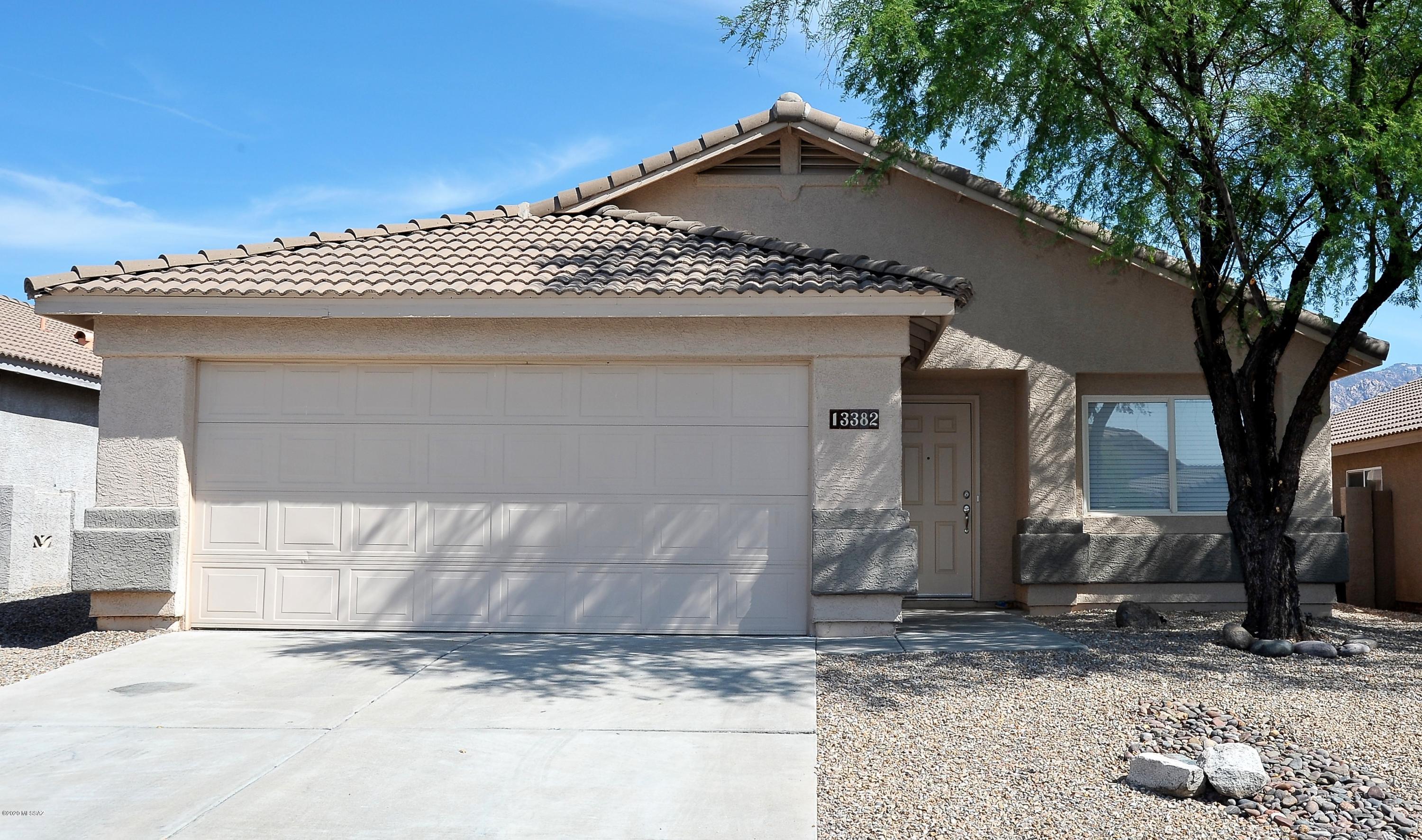 Oro Valley 4 bedroom with all tile flooring throughout with no carpet! Beautiful with Catalina Mountain views from the large back yard & East facing covered patio.  Granite in kitchen & updated vanities in bathrooms.  Ceiling fans in all bedrooms & family room.  2 car garage with epoxy coating.  Located near end of cul-de-sac street with easy access to Oracle Road.  Only minutes from Oro Valley Market Place, Oro Valley Hospital & Catalina State Park.  Amphi schools:  Painted Sky Elementary, Coronado Middle & Ironwood Ridge High.  Non-smoking home.  One year minimum lease.  $45 application fee per adult.  Renters insurance required.  Small pet considered - call listing agent for additional costs for pets.
