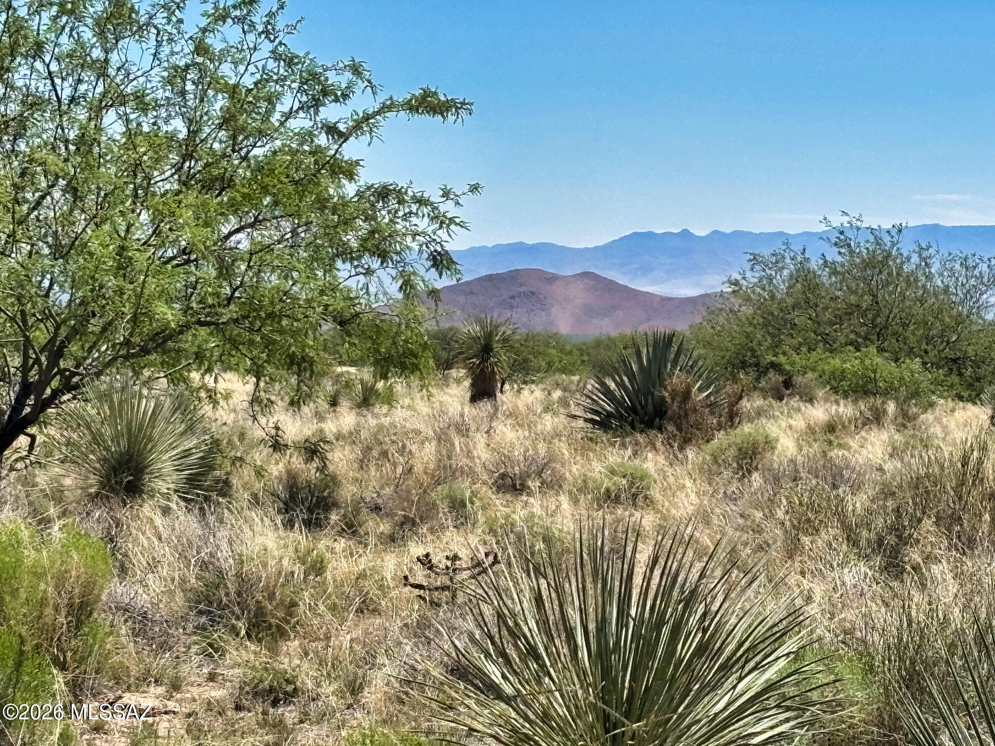 2 lots totaling 2.29 Acres in a good accessible location. Off of Desert Rd which is a county maintained road. 
Nice Mountain Views. Frame built homes only. Can be a tiny home as long as it is site built. NO HOA. Goes by Cochise County Zoning Regs for SR-43. 30 Minutes to Benson. 25 Minutes to Willcox. 20 Minutes to I10. Plat map under the documents tab on listing