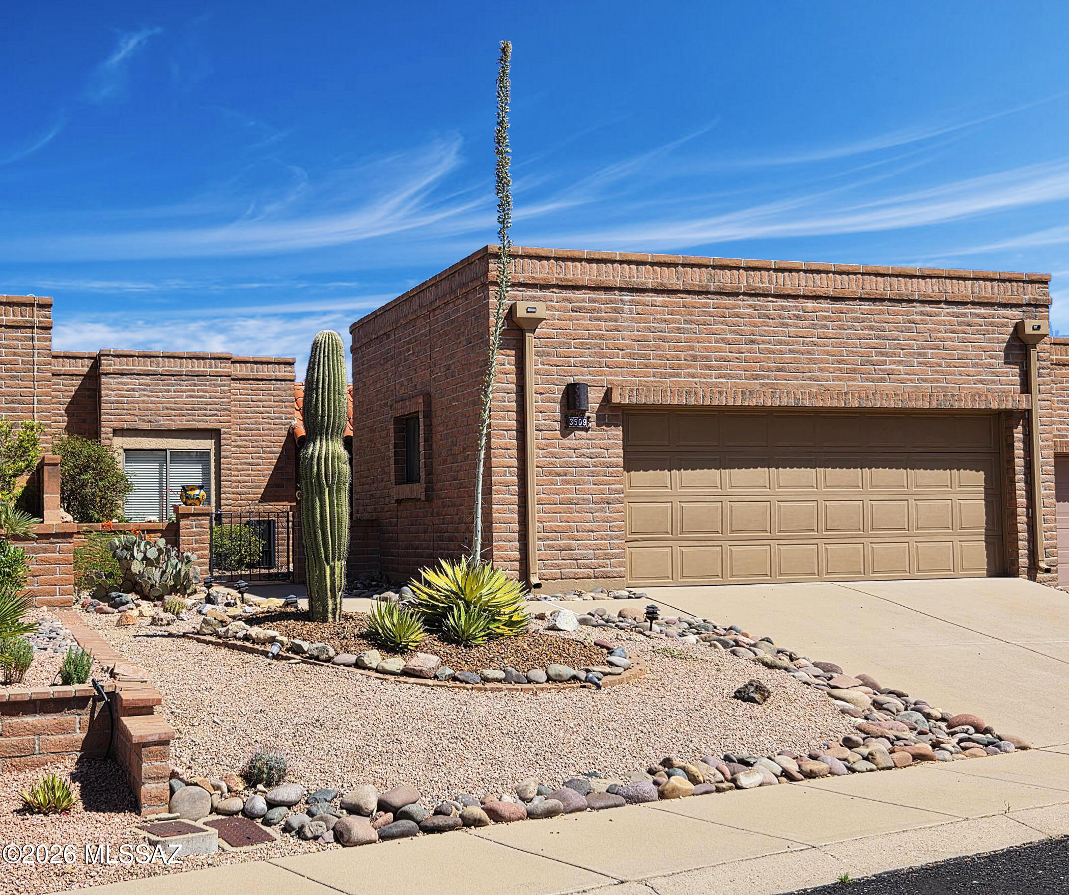 It isn't often that you find that special home!  Step inside the welcoming foyer and your eyes are immediately drawn to the panoramic mountain views beyond.  Lovingly cared for, and beautifully maintained, this spacious 1,625 sq. ft. home offers comfort, charm, and the perfect Arizona lifestyle.  Featuring 2 bedrooms, 2 baths, and a great room with fireplace, the home blends everyday livability with ideal entertaining space.  The eat-in kitchen is both cheerful and functional, featuring granite countertops, stainless steel appliances, and abundant cabinetry.

The outdoor living area is truly an entertainer's dream--cozy enough for intimate evenings under the stars, yet spacious enough to host family and friends with ease.  Morning coffee and evening cocktails somehow taste even better while taking in the ever-changing views of the majestic Santa Rita Mountains!  Conveniently located near golf courses and GVR facilities.